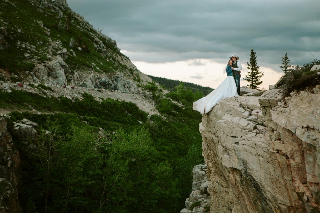 Glacier National Park Wedding Photos Couple on Cliff