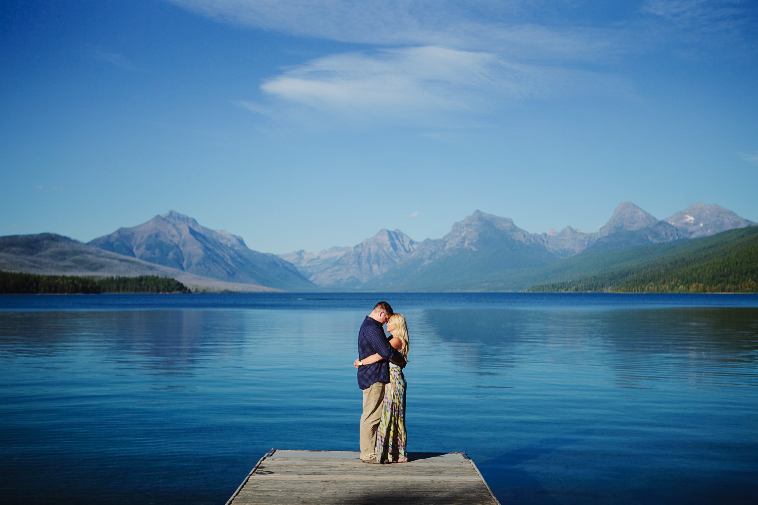 Glacier National Park Engagement Photos Lake McDonald Couple Hugging