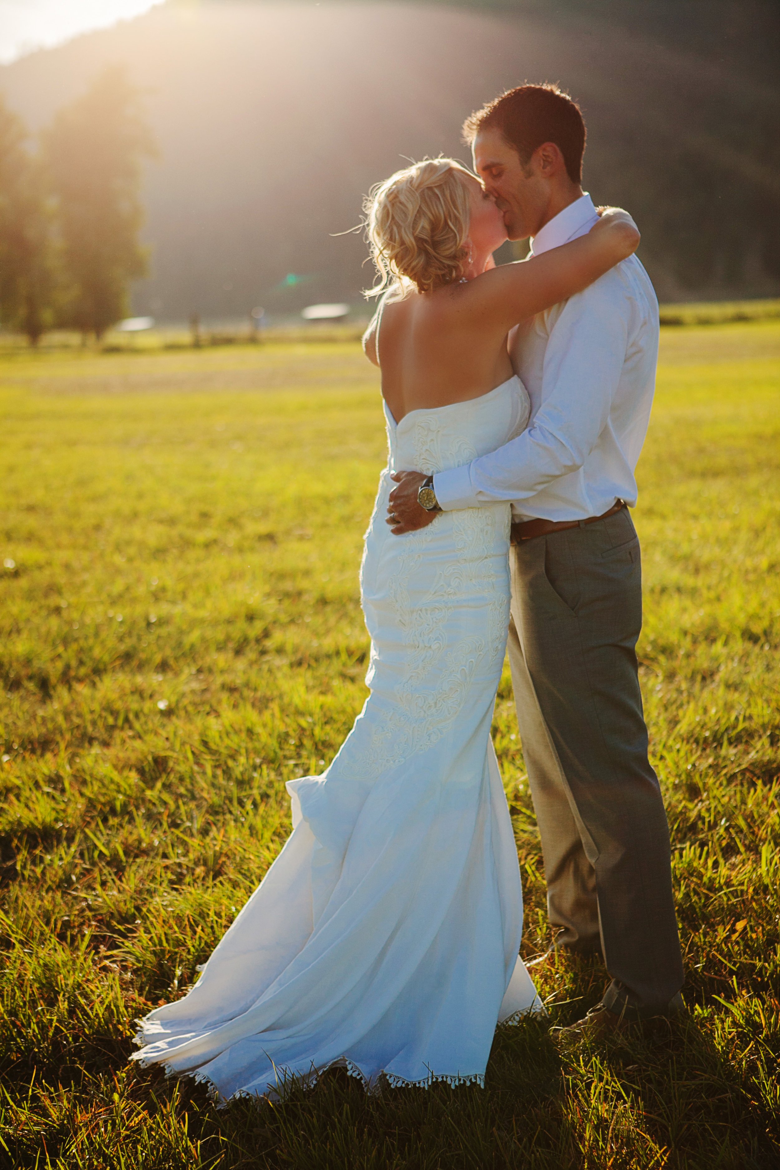 St Regis MT Wedding Photos Couple Kissing