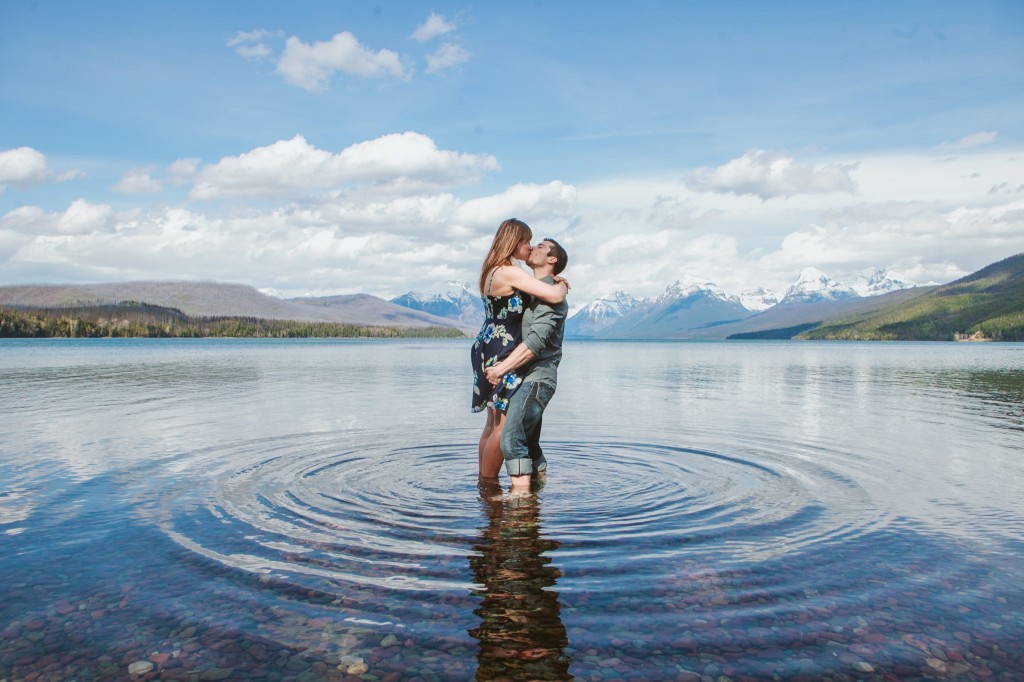 Glacier National Park Engagement Photos Couple Kissing in the Lake