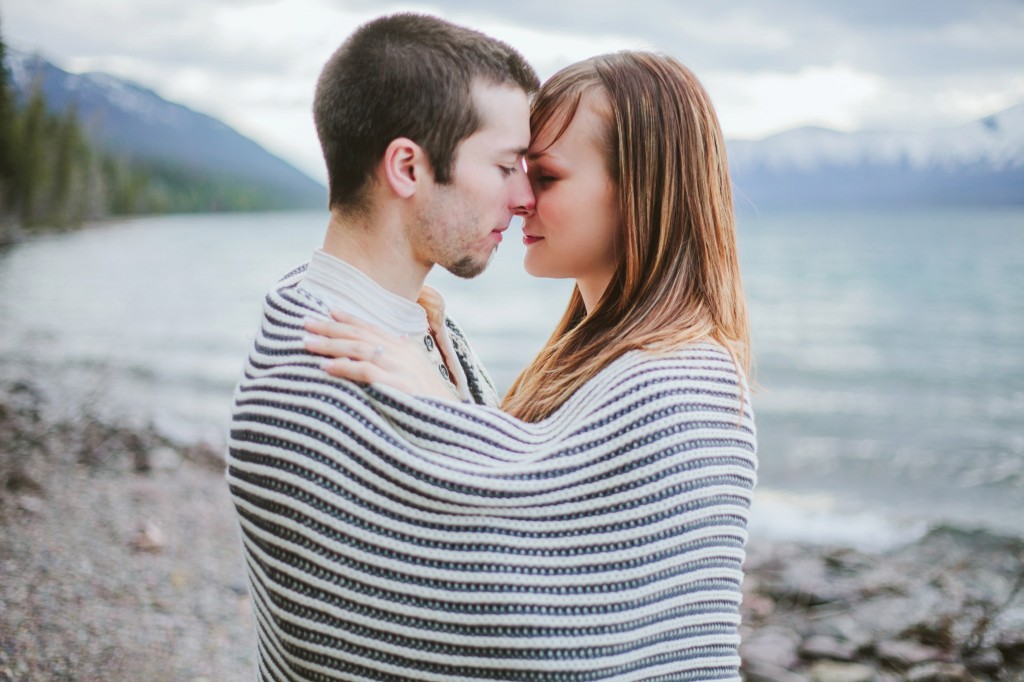 Glacier National Park Engagement Photos Couple Hugging