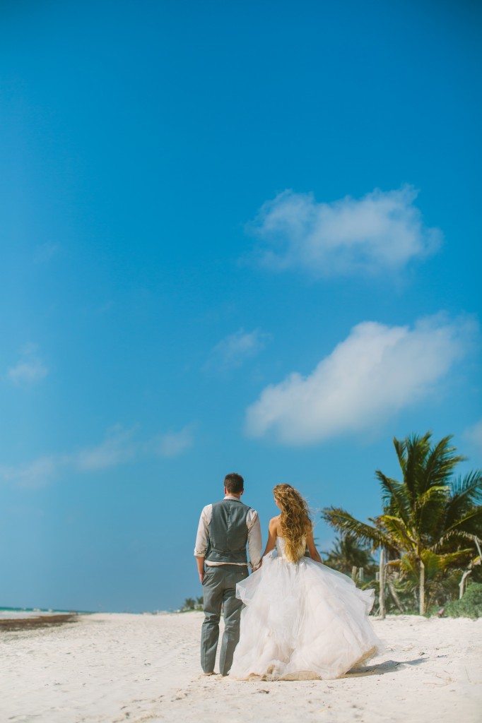 Tulum Mexico Destination Wedding Photography Couple Holding Hands Walking on the Beach