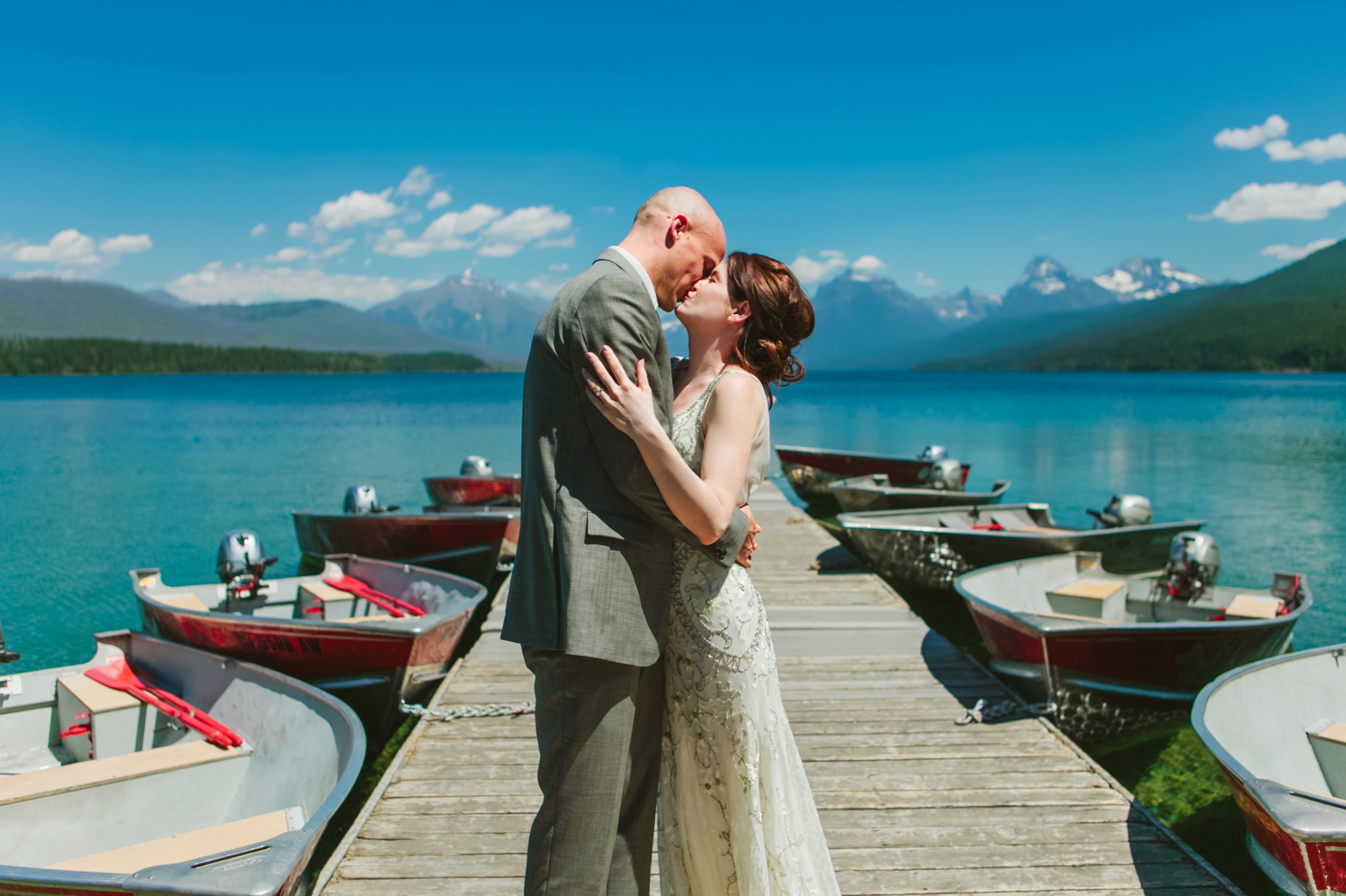 Glacier National Park Montana Elopement Photos Couple Kissing on Dock
