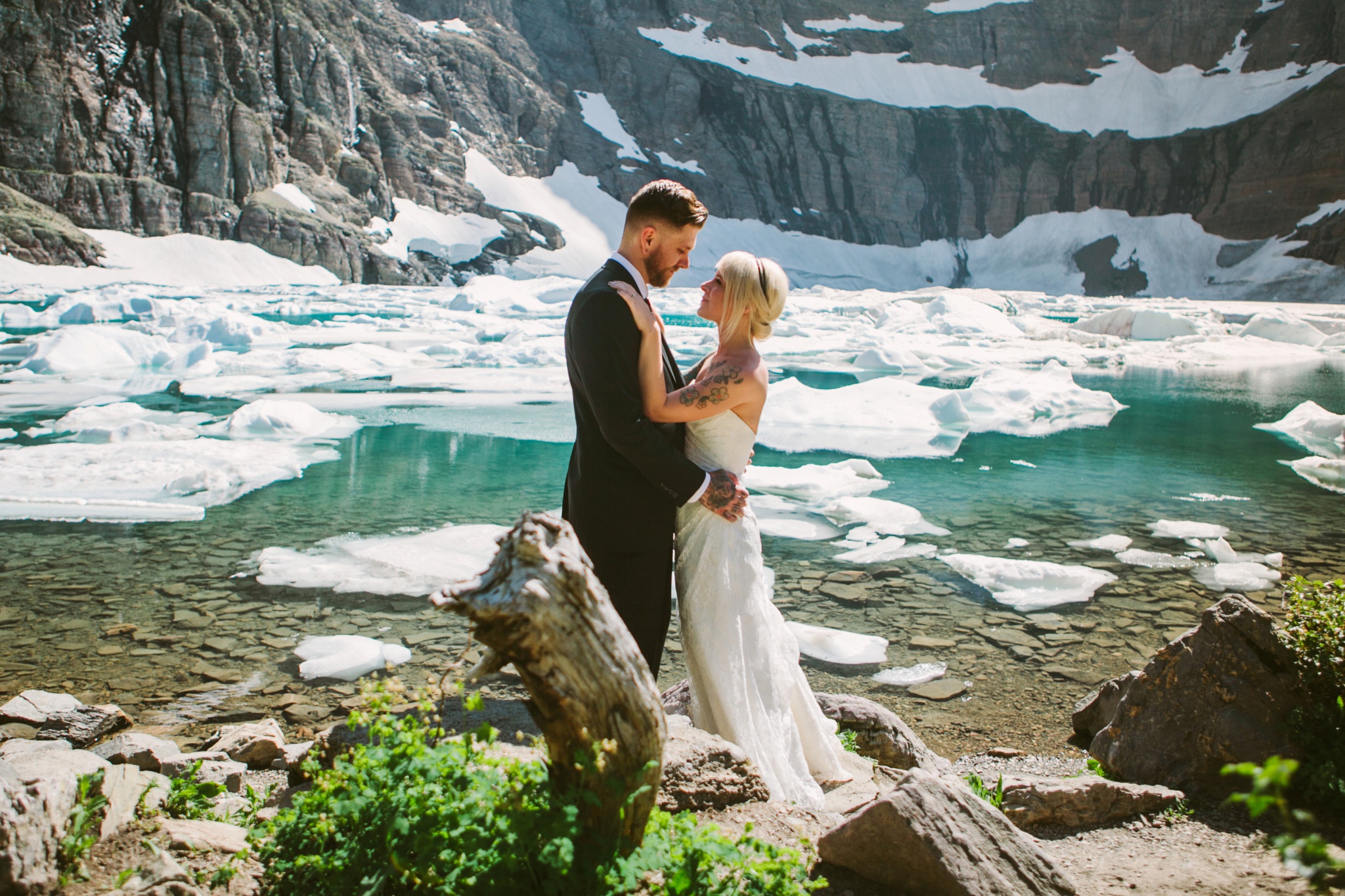 Iceberg Lake Glacier National Park Elopement Couple Hugging
