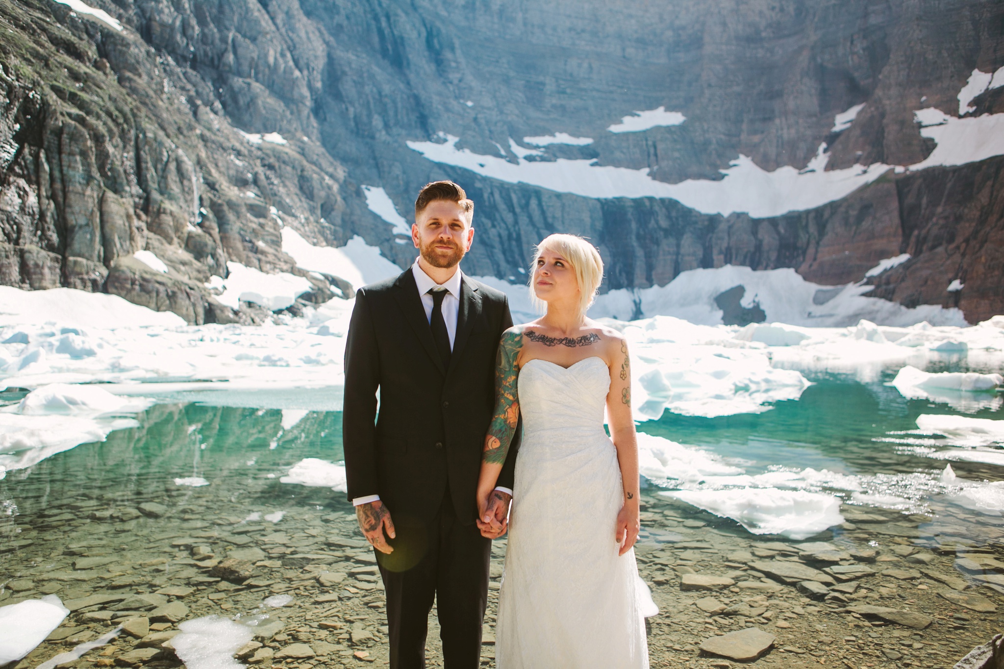 Iceberg Lake Glacier National Park Elopement Couple Holding Hands