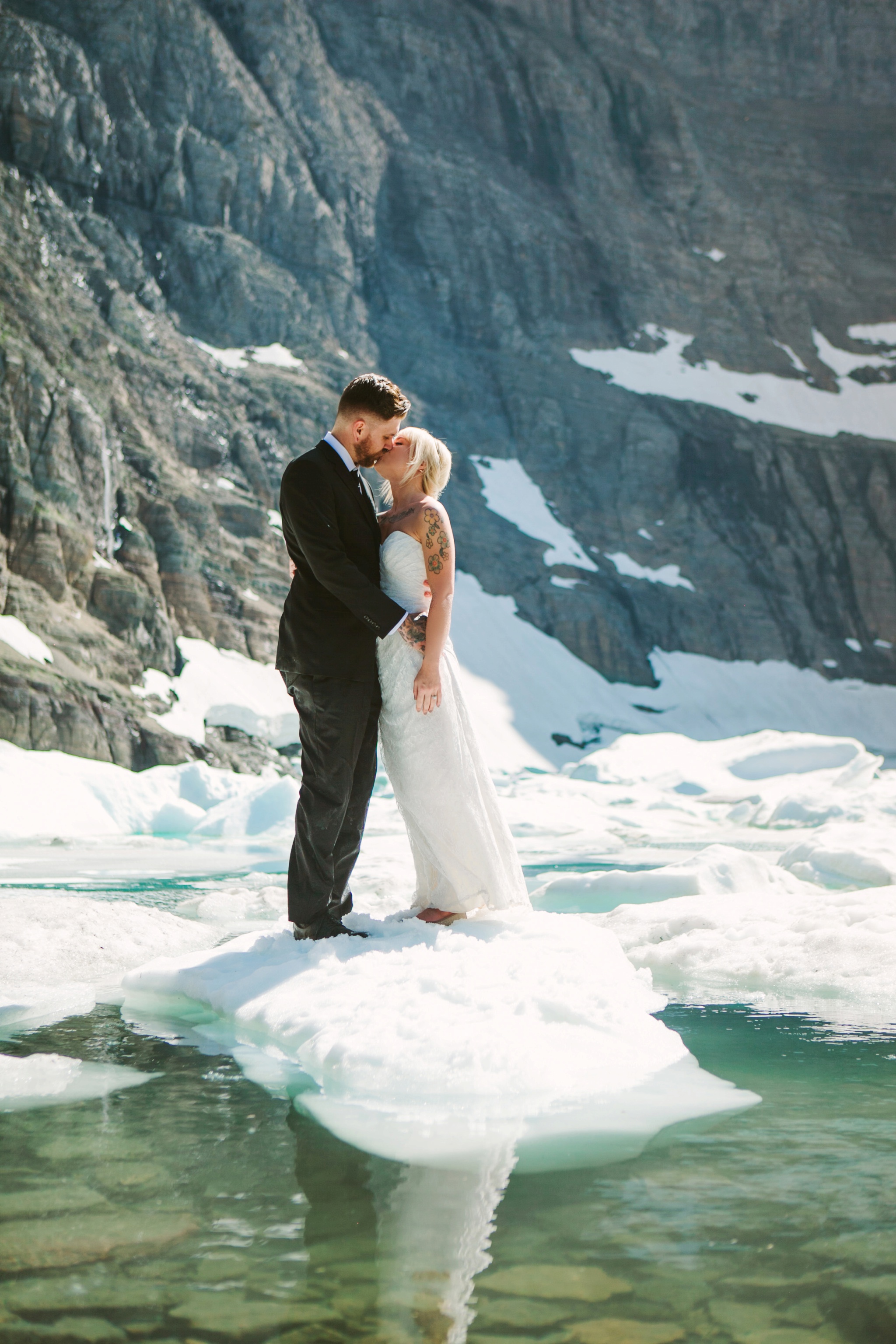 Iceberg Lake Glacier National Park Elopement Couple Kissing