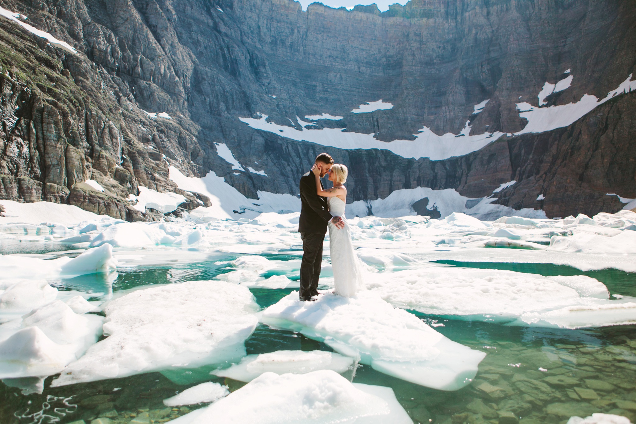 Iceberg Lake Glacier National Park Elopement Couple Hugging