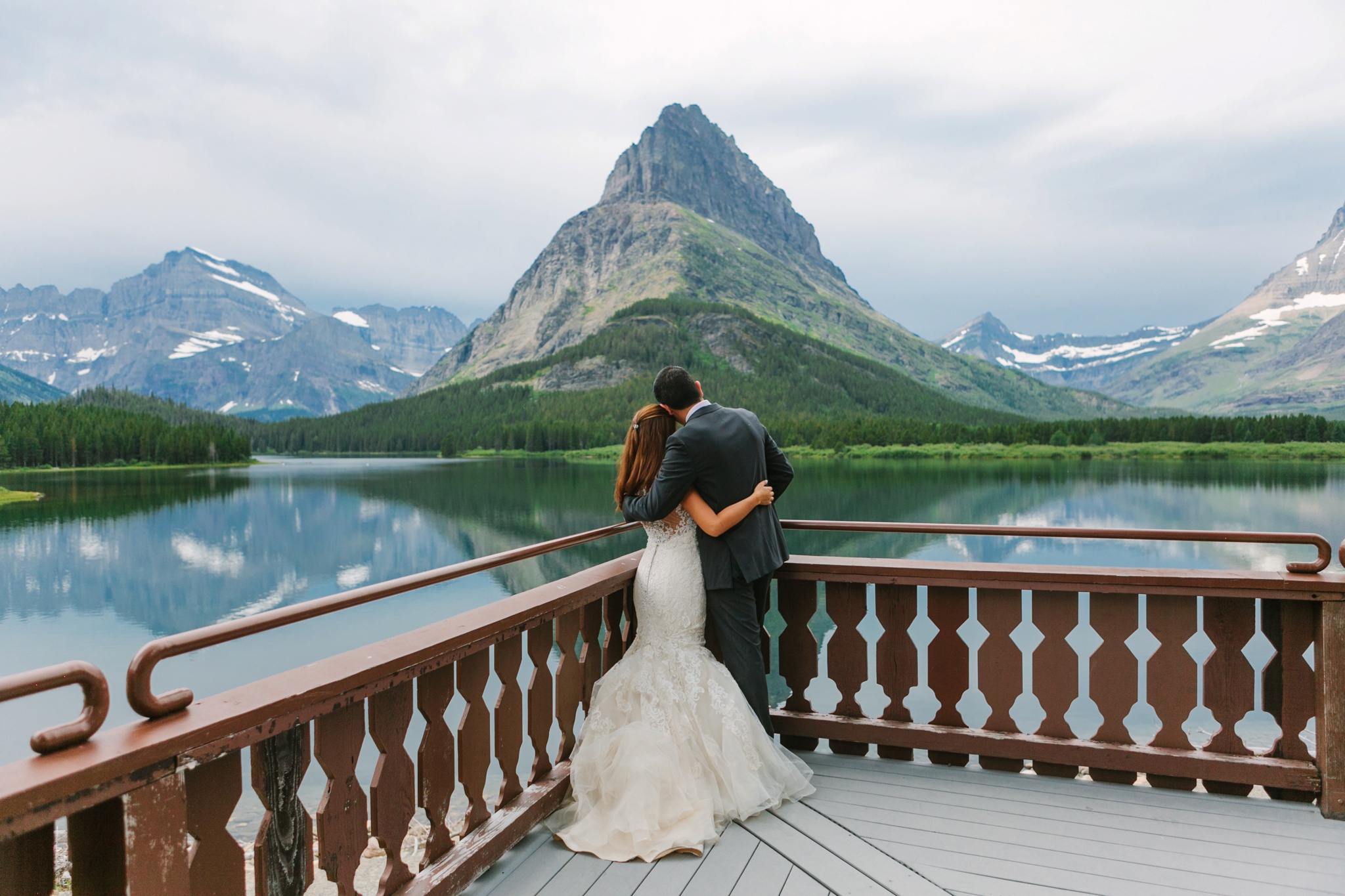 Glacier National Park Many Glacier Wedding Couple Embracing
