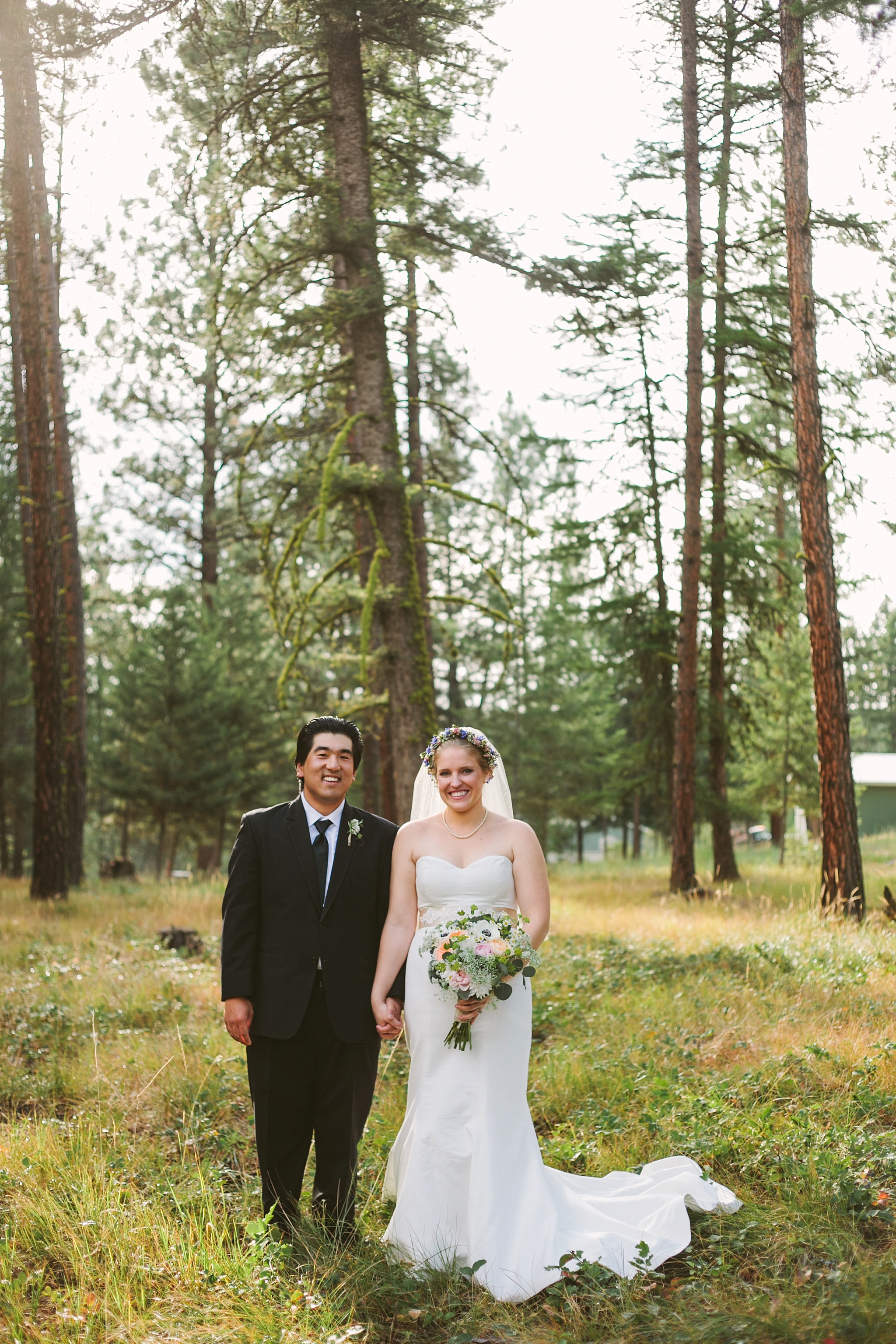 Missoula MT Backyard Forest Wedding Couple Holding Hands