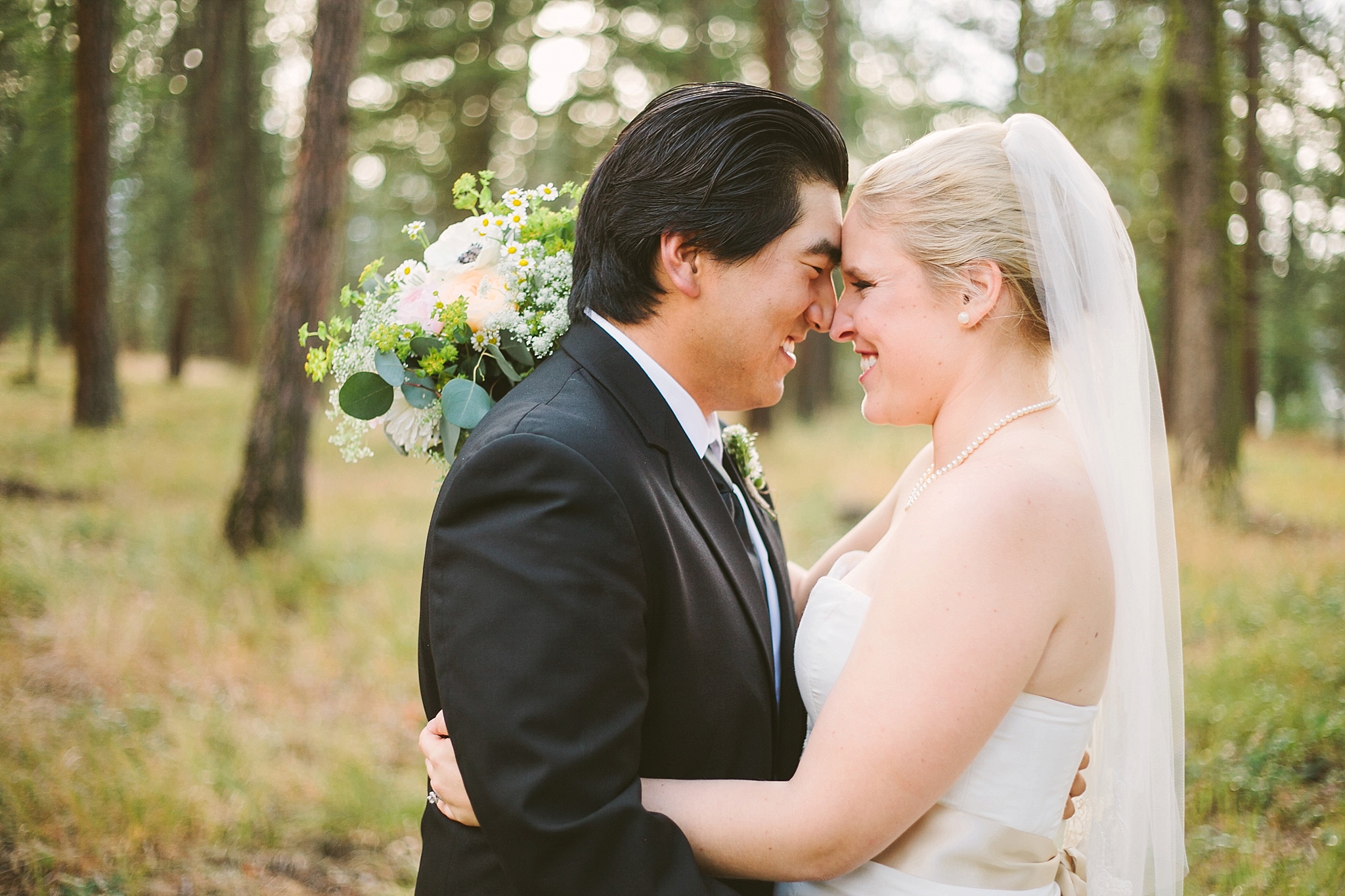 Missoula MT Backyard Forest Wedding Couple Laughing