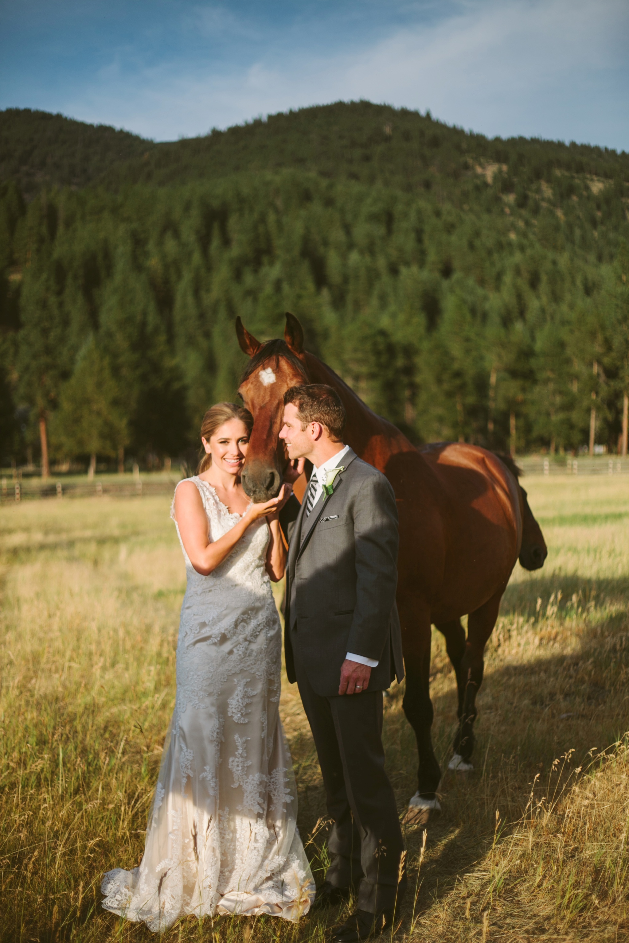 Missoula MT Summer Backyard Wedding Photos Couple with Horse