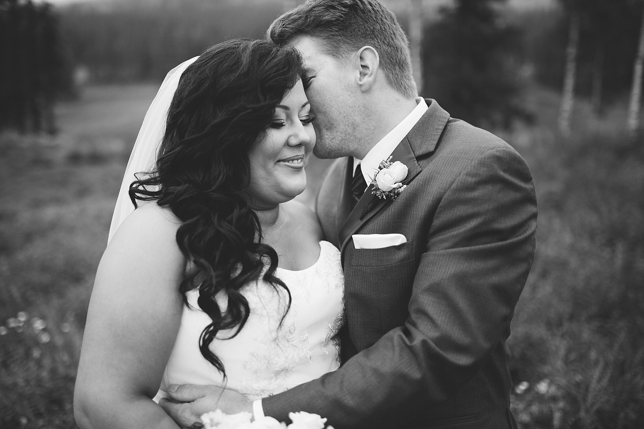 Silvertip Resort Canmore Alberta Wedding Photos Couple Kissing