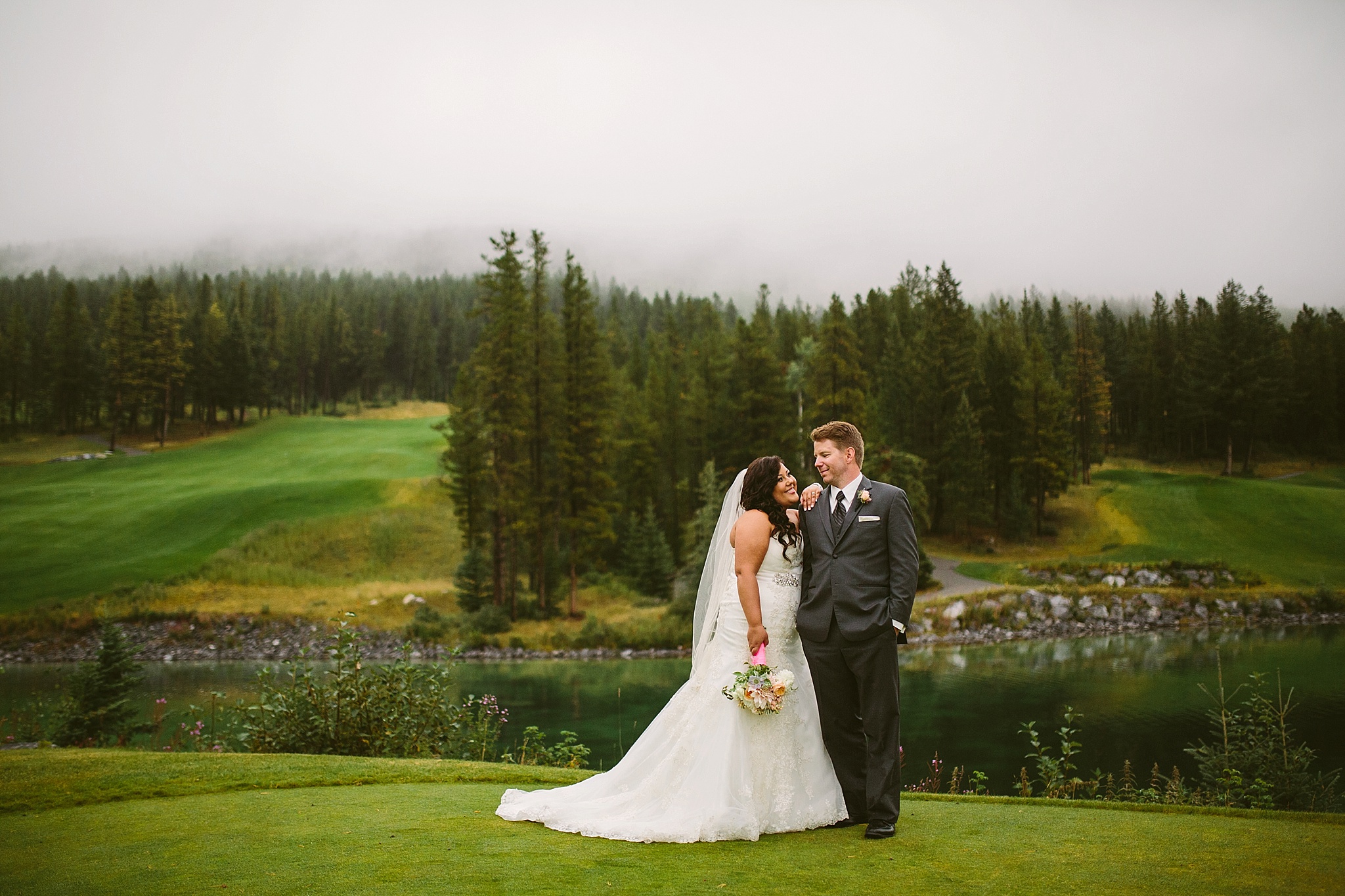 Silvertip Resort Canmore Alberta Wedding Photos Couple Laughing