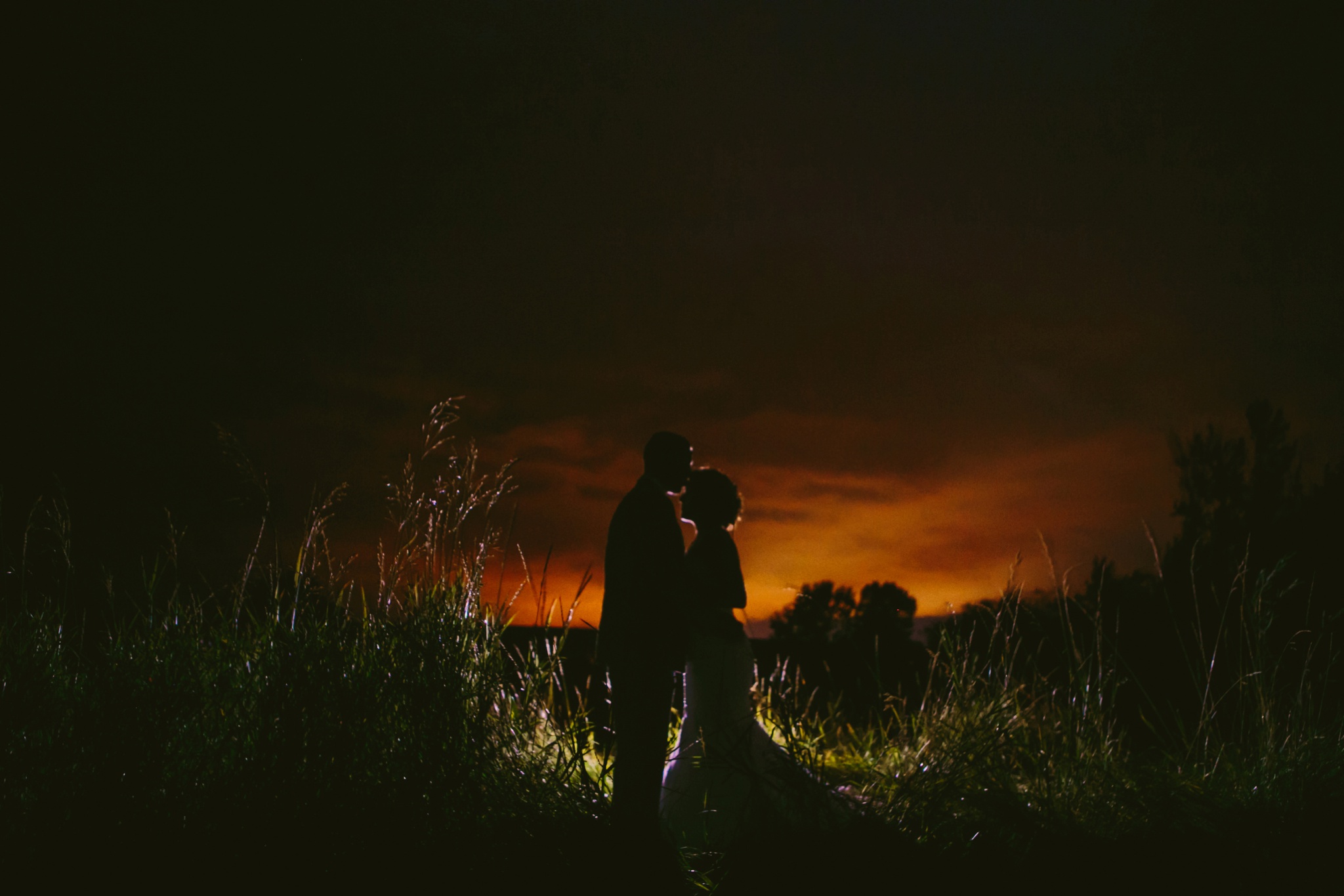 Kleffner Ranch Helena MT Wedding Photos Couple Kissing Sunset