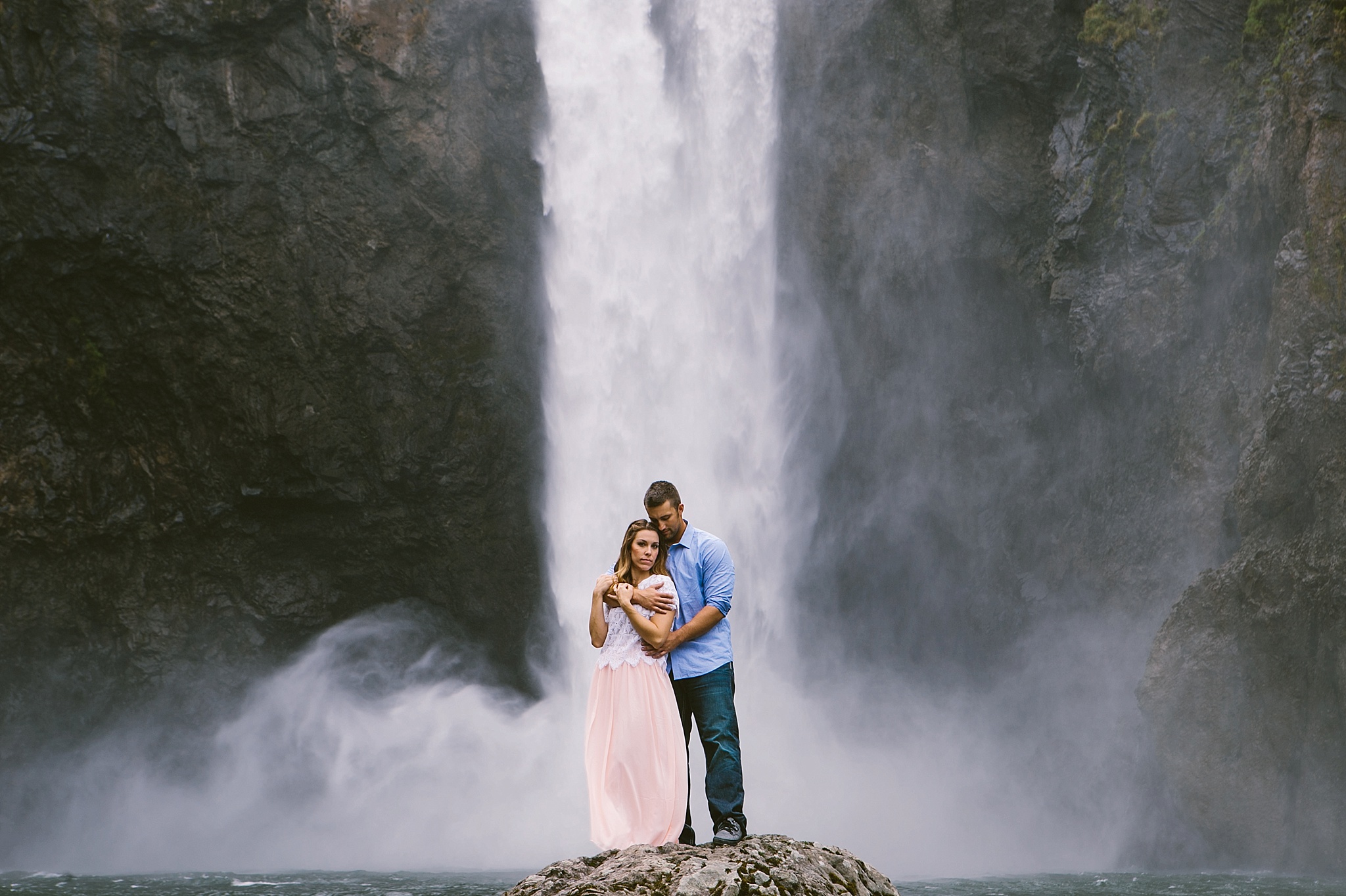 Snoqualmie Falls Seattle WA Engagement Photos Couple Hugging