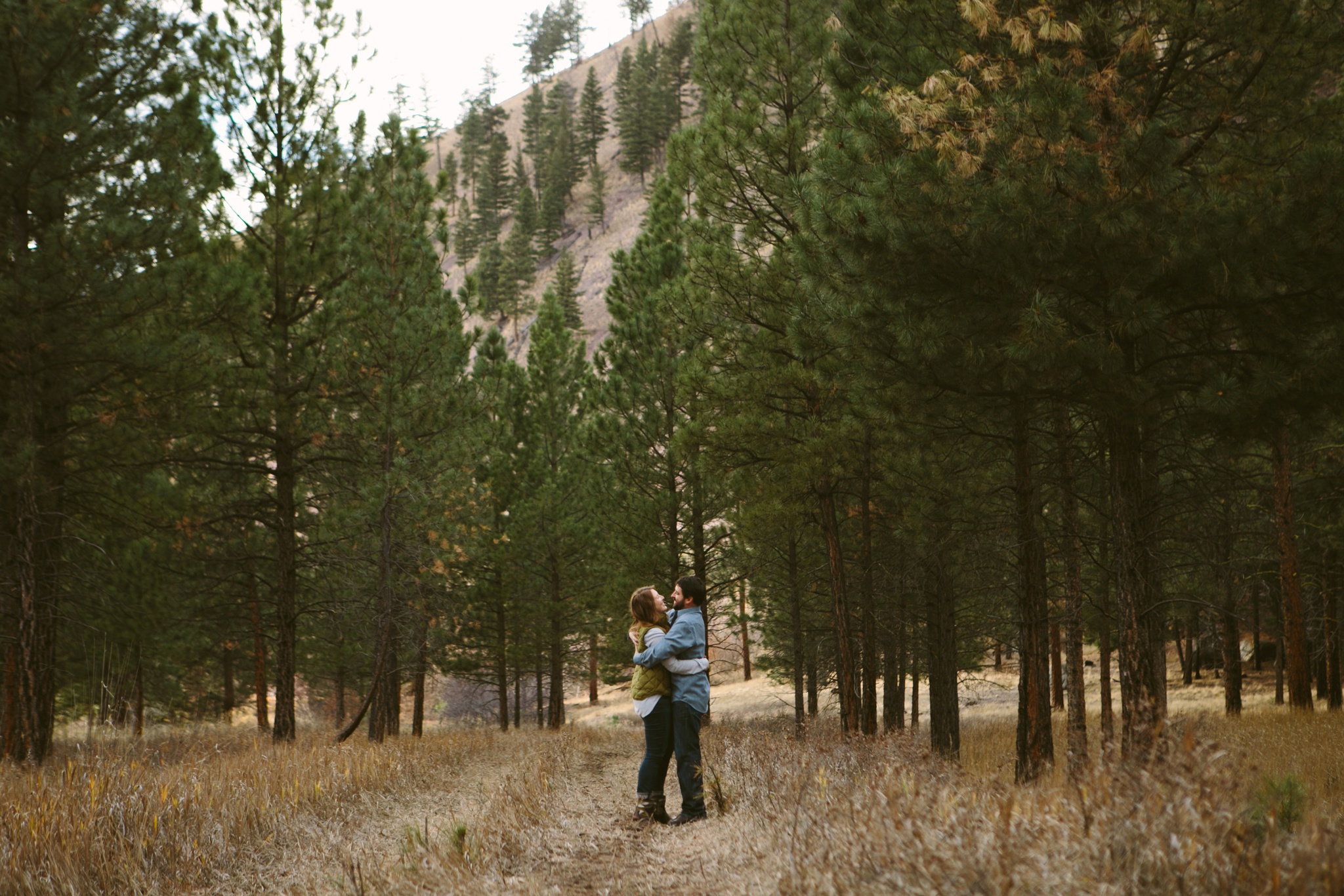 Missoula MT Forest Engagement Photos Couple Hugging 