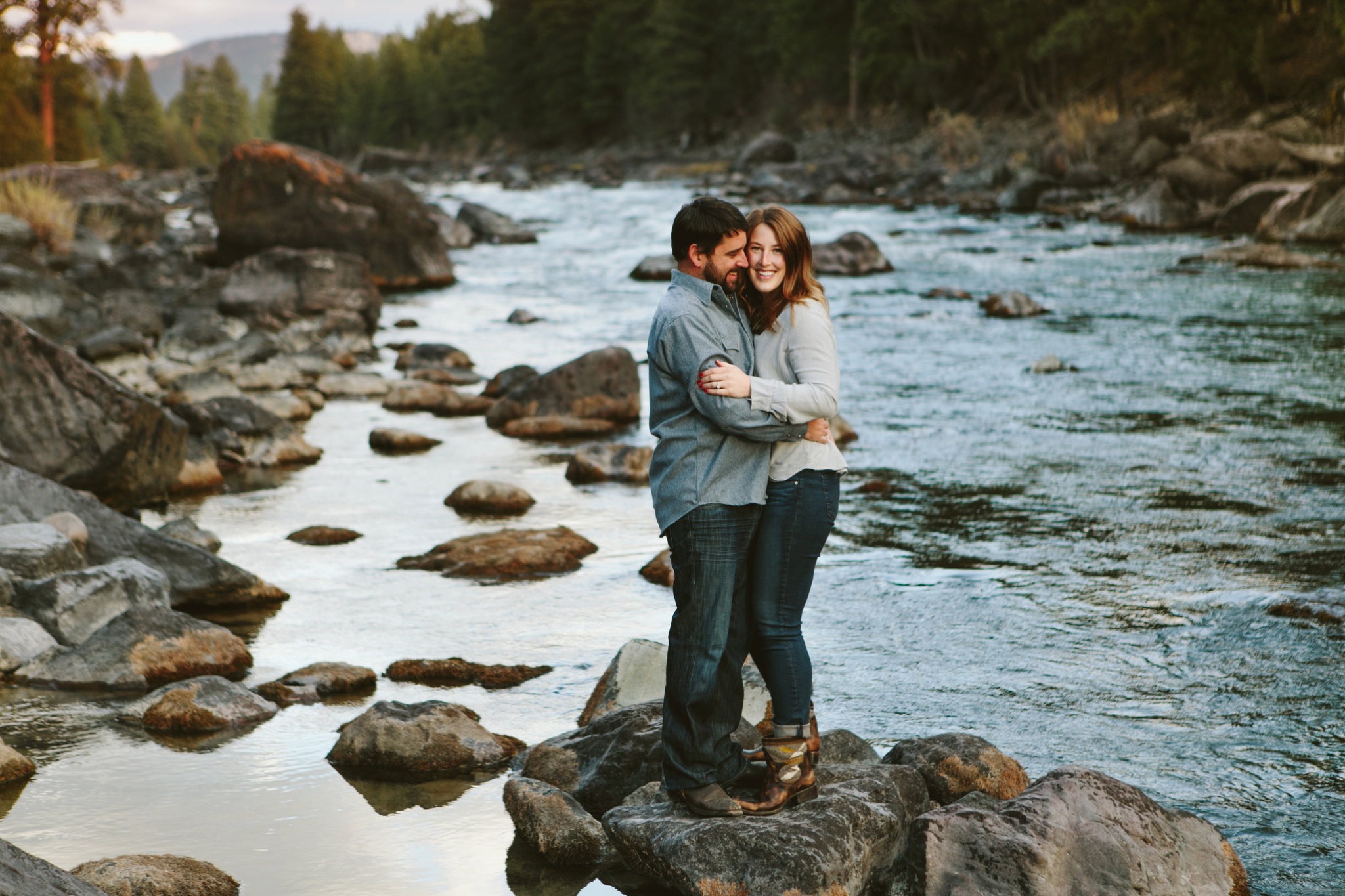 Missoula MT Engagement Photos Couple Hugging in River