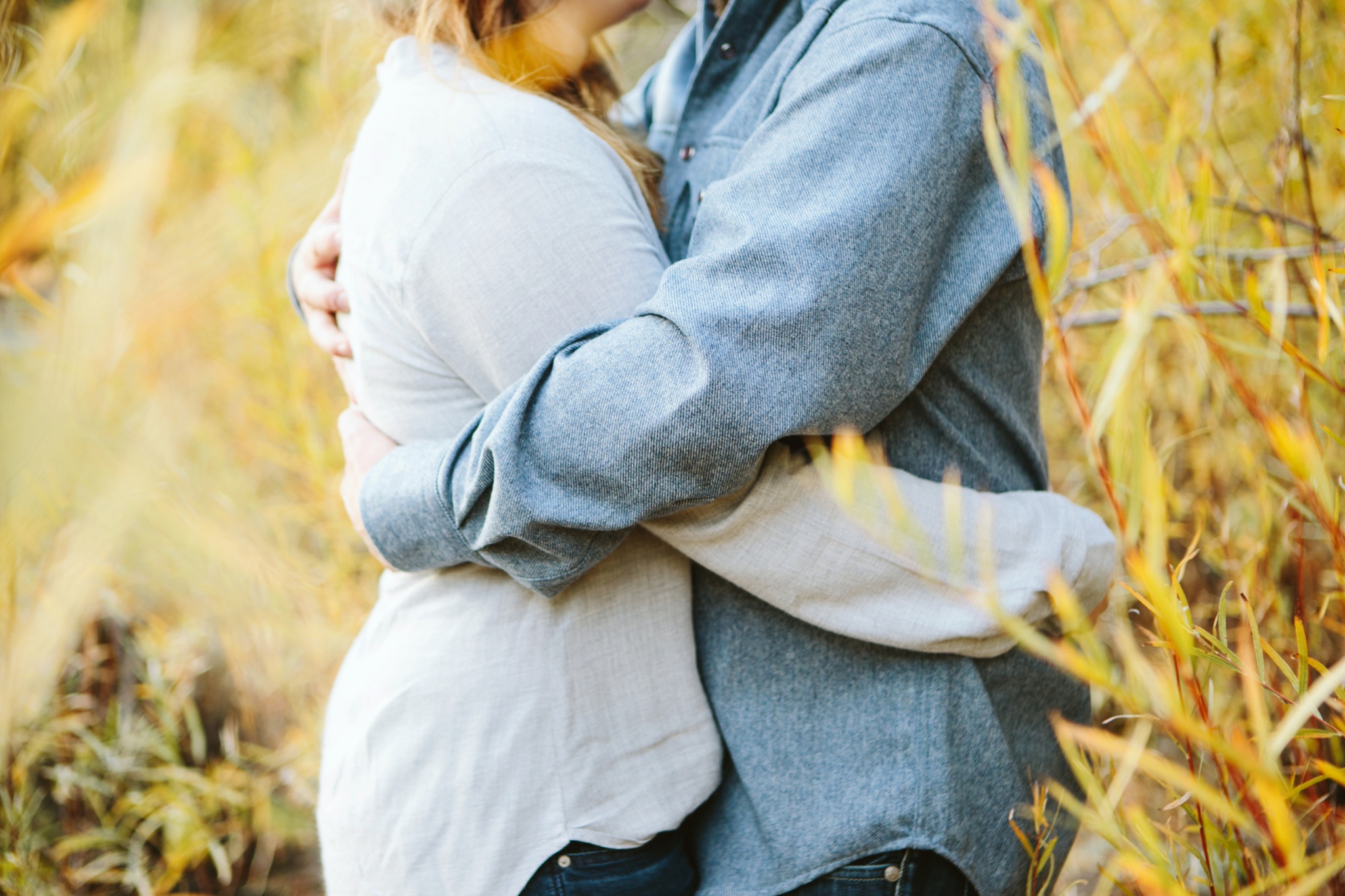 Missoula MT Engagement Photos Couple Hugging in Field