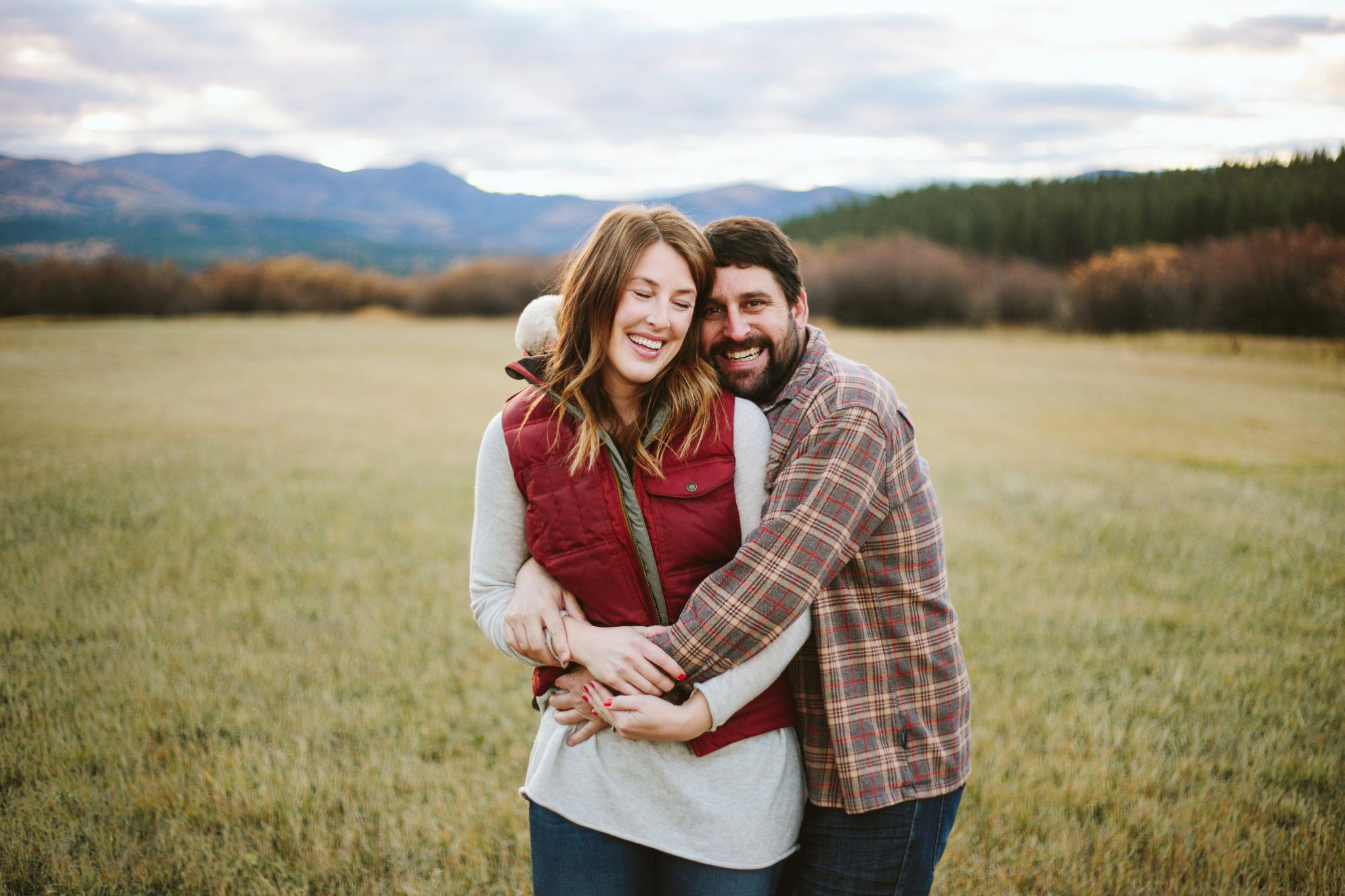 Missoula MT Engagement Photos Couple Hugging in Field