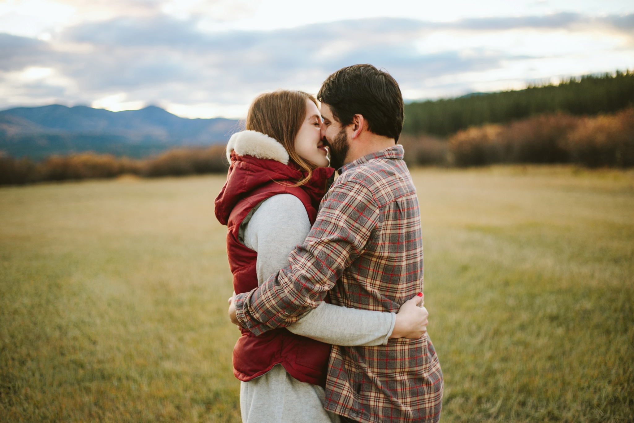 Missoula MT Engagement Photos Couple Kissing in Field