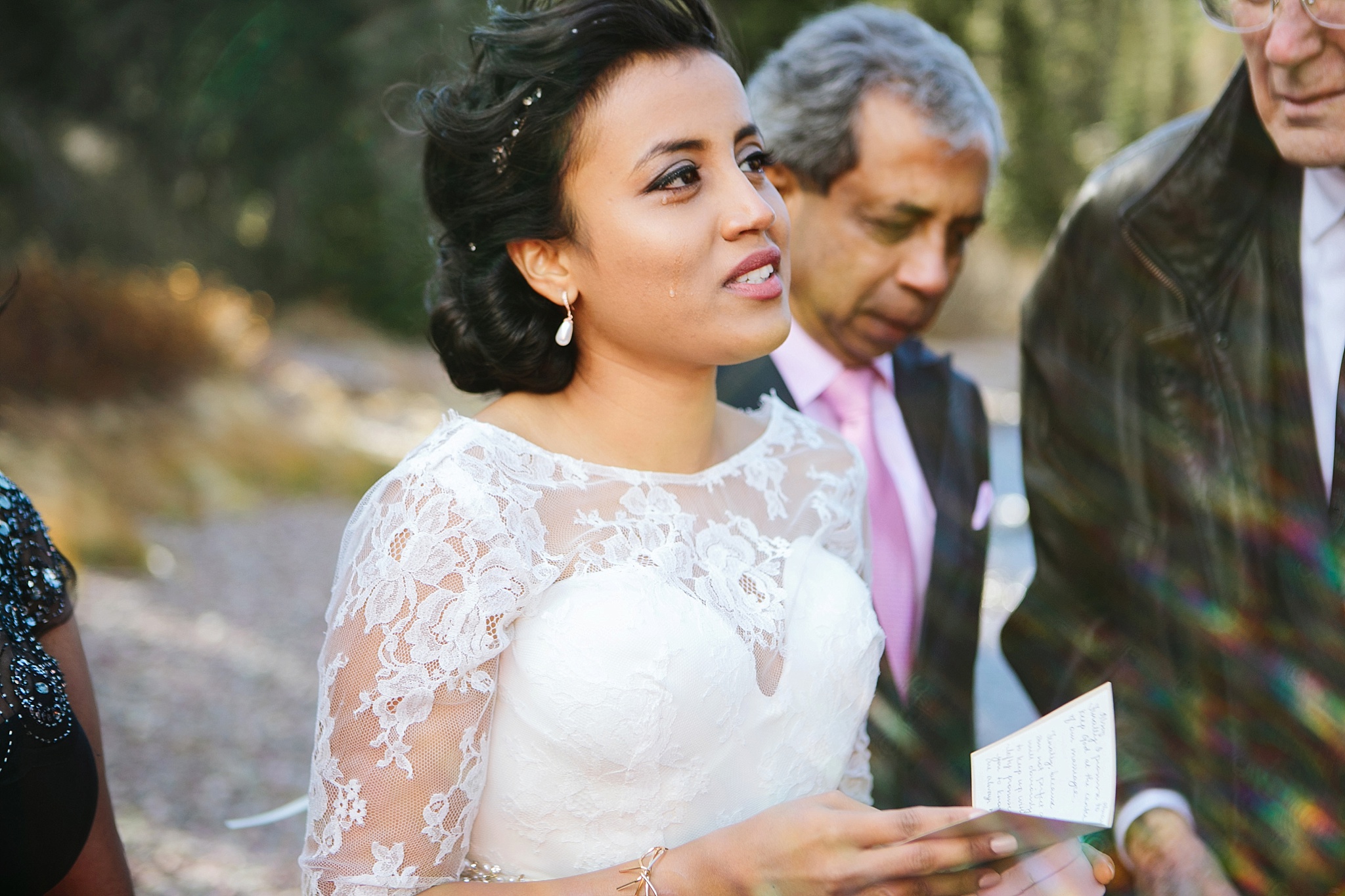 Josephine Lake Glacier National Park Elopement Ceremony Bride Crying