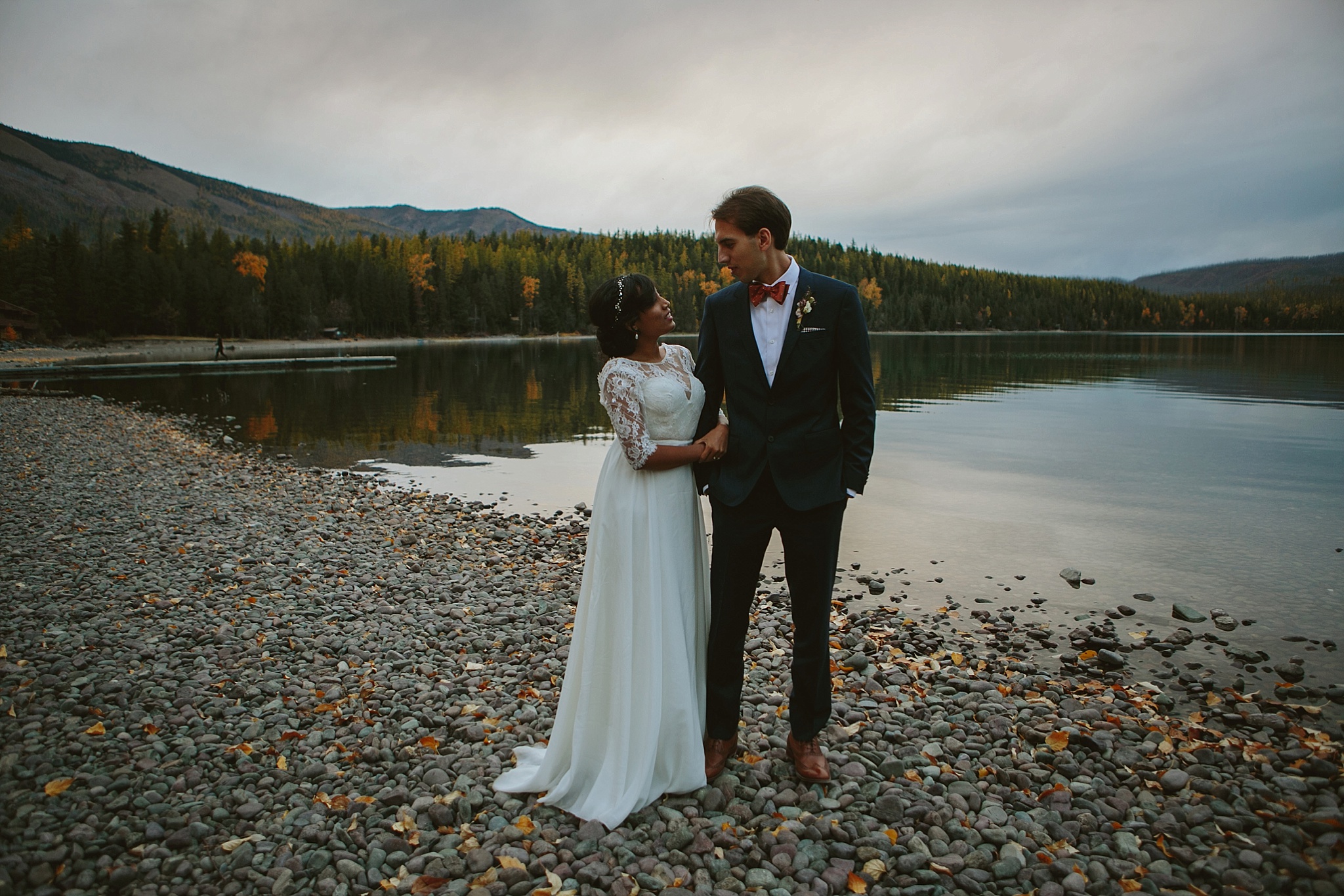 Glacier National Park Wedding Photos Couple at Lake McDonald Holding Hands