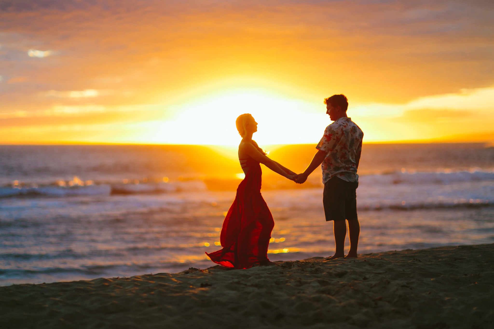Kauai HI Beach Engagement Photos Couple Holding Hands at Sunset