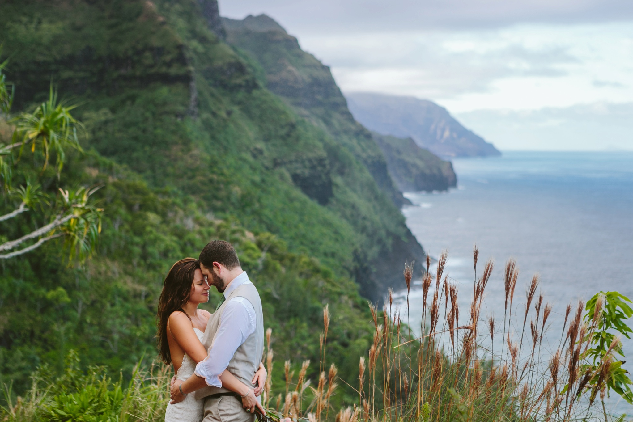 Kauai HI Napali Coast Kalalau Trail Elopement Adventure Couple Embracing