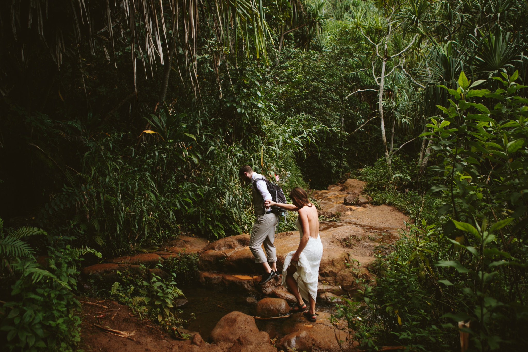 Kauai HI Napali Coast Kalalau Trail Elopement Adventure Hike Couple Holding Hands