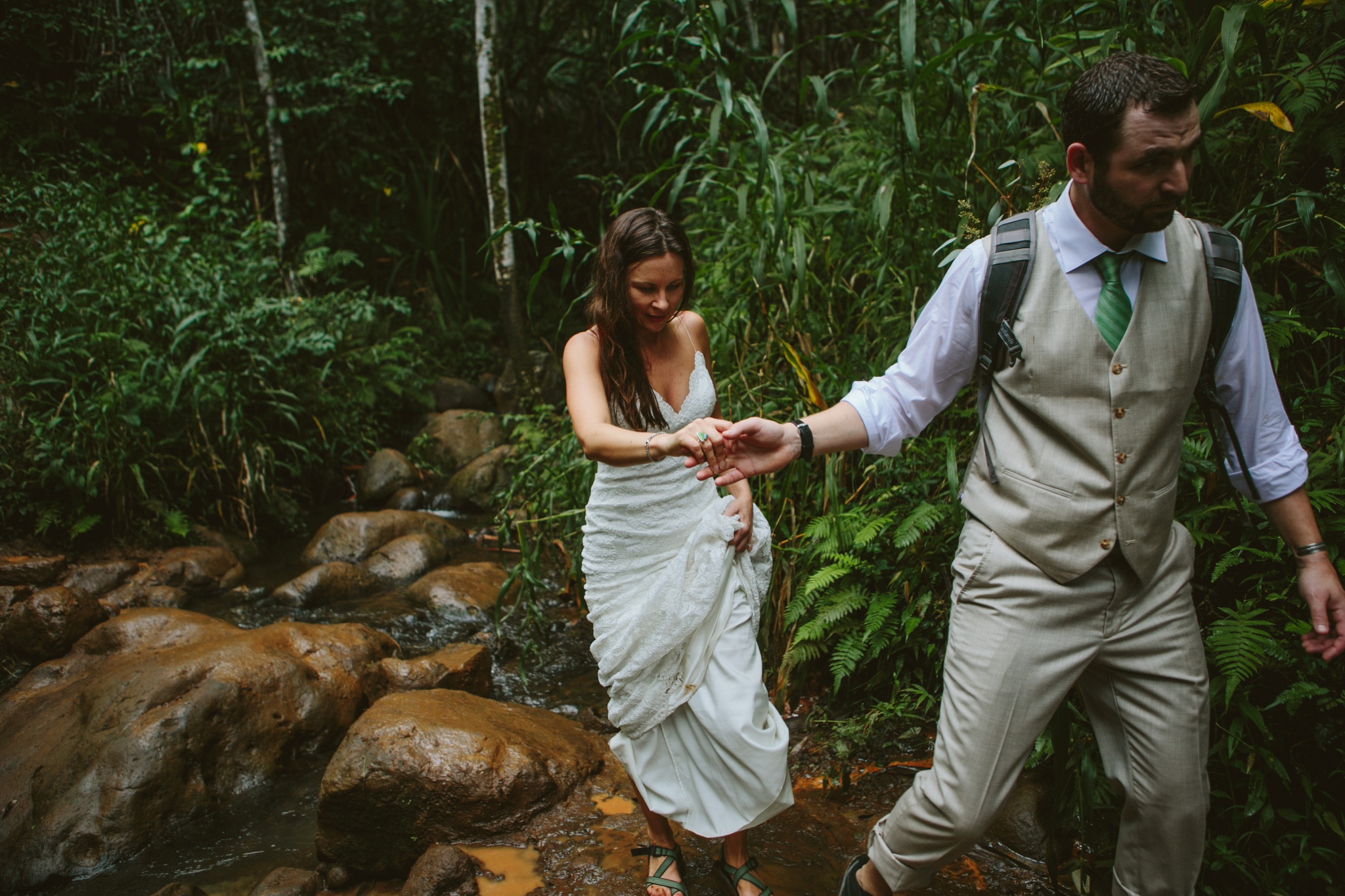 Kauai HI Hanakapiai Falls Elopement Couple Holding Hands Hiking