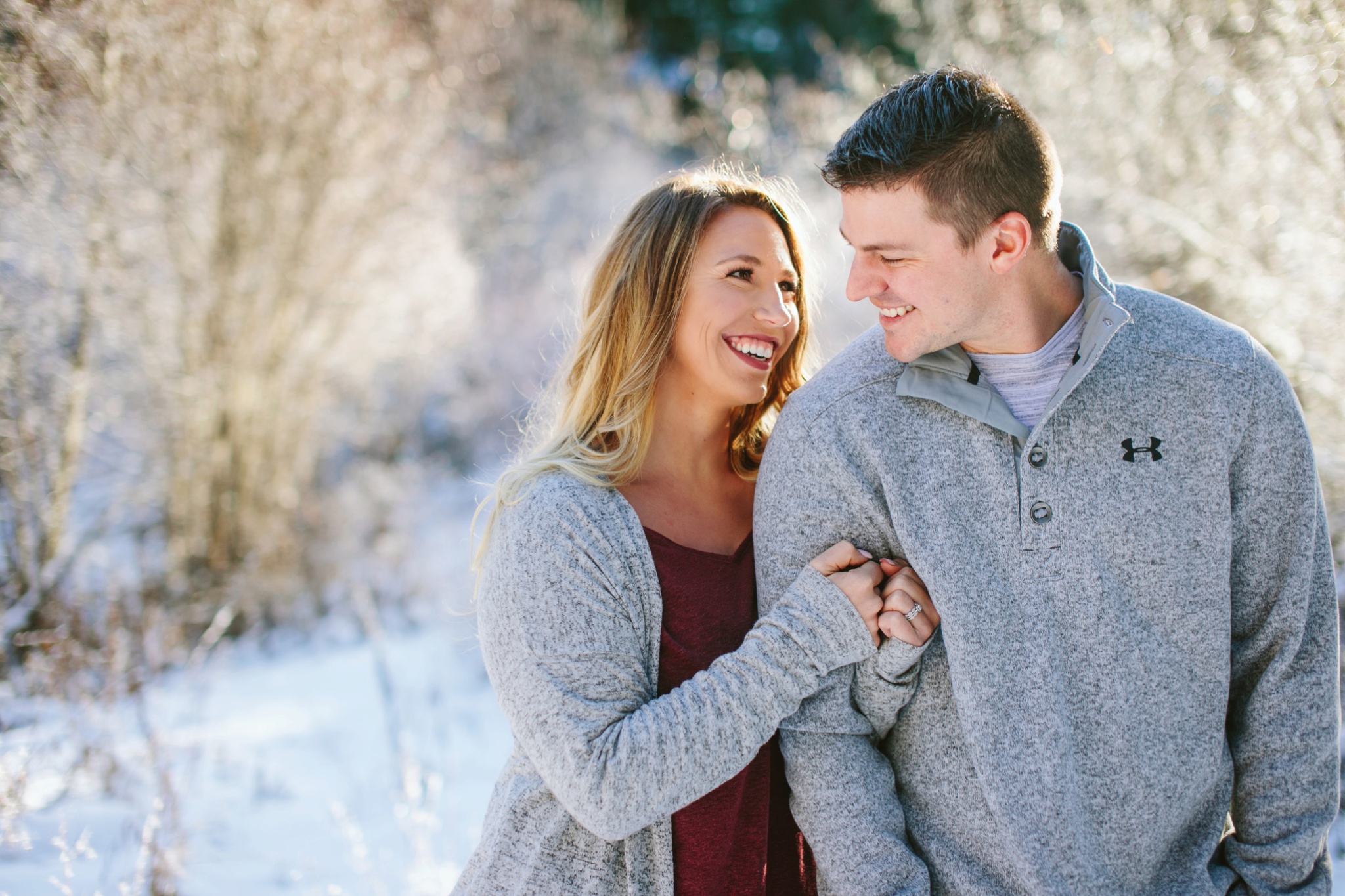 Missoula MT Winter Wonderland Engagement Photos Couple Laughing
