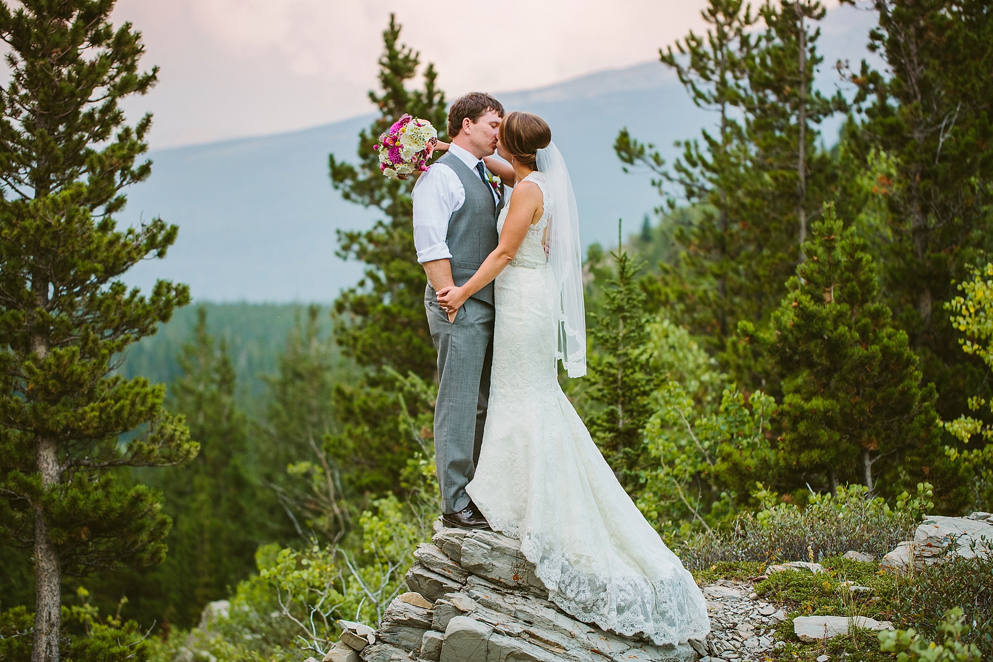 Many Glacier National Park Elopement Photos Bride and Groom Kissing