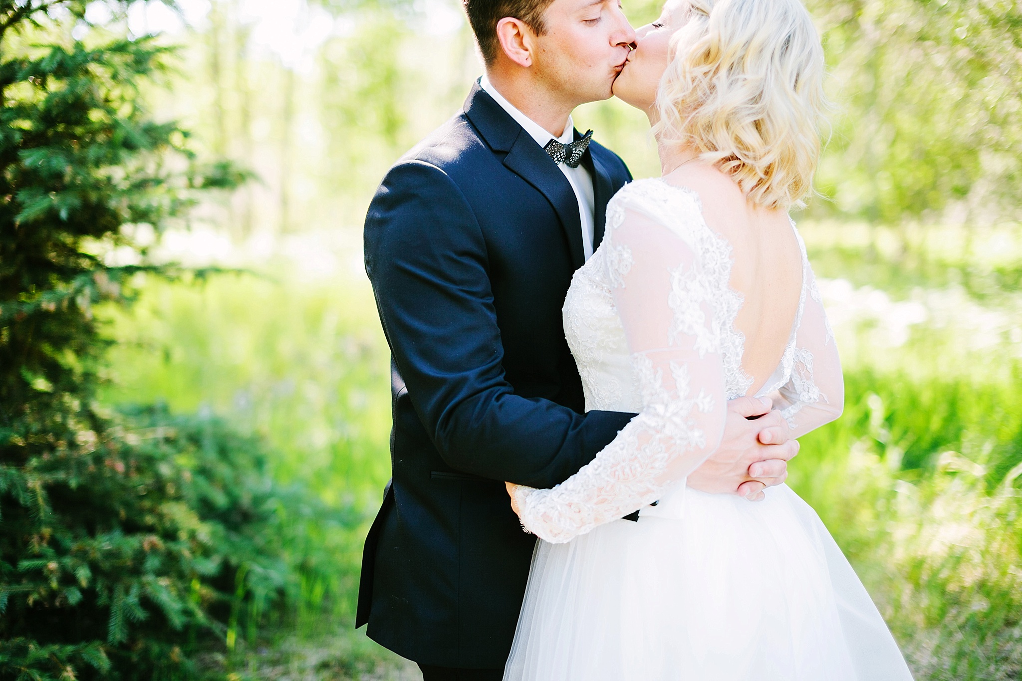 Missoula MT Backyard Wedding Photos Bride and Groom Kissing