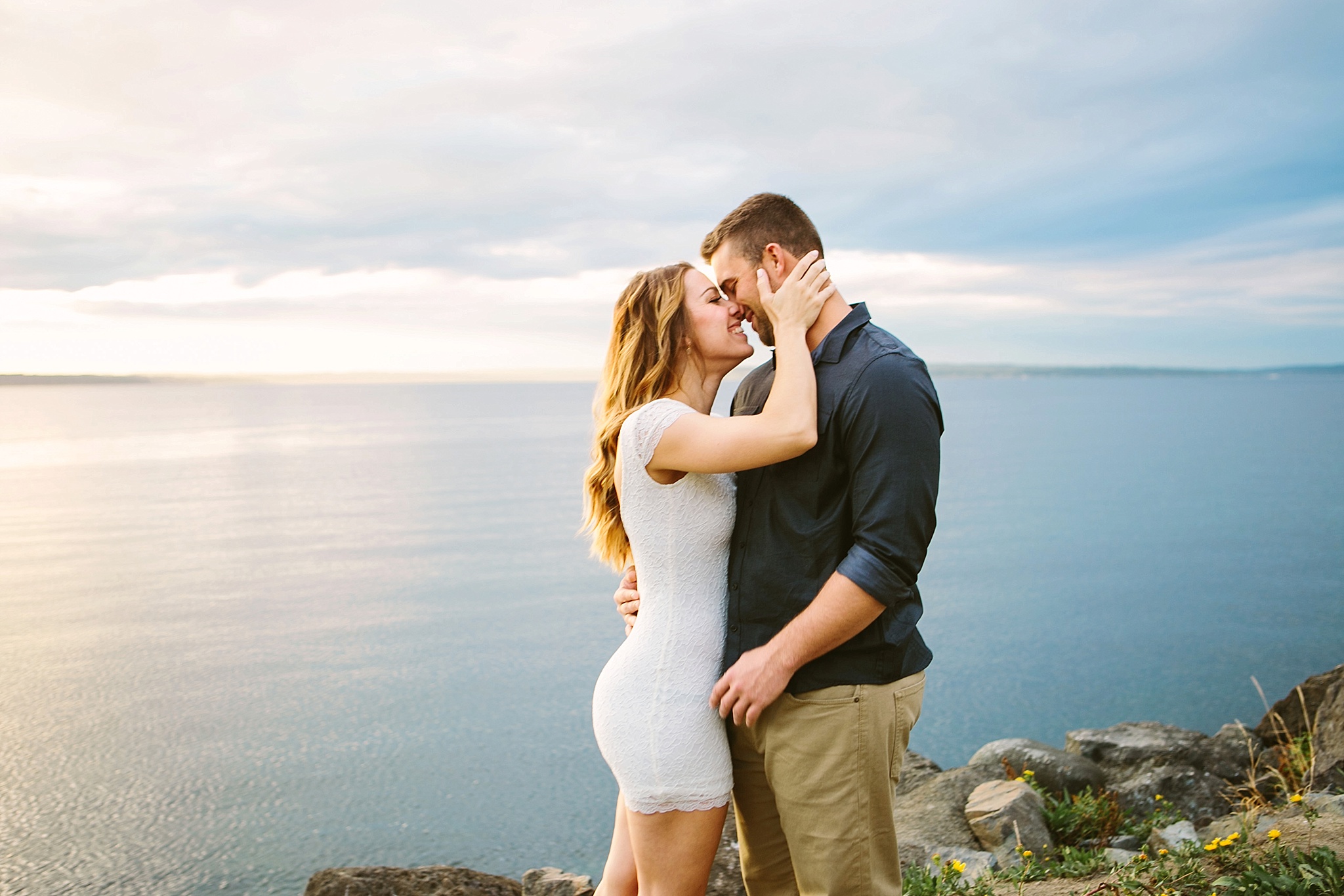 Seattle WA Engagement Photos Bride and Groom Kissing by the Ocean