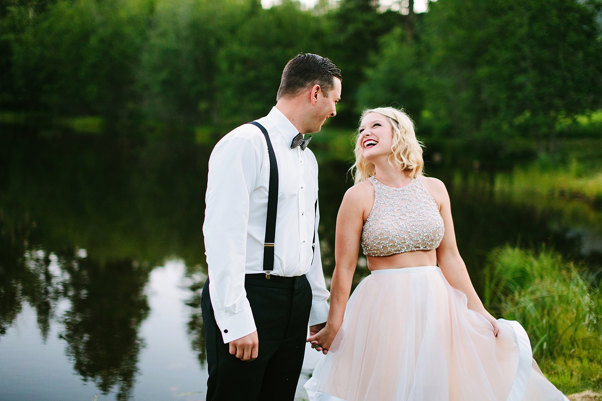 Missoula MT Backyard Wedding Photos Bride and Groom Holding Hands Laughing in Second Dancing Dress