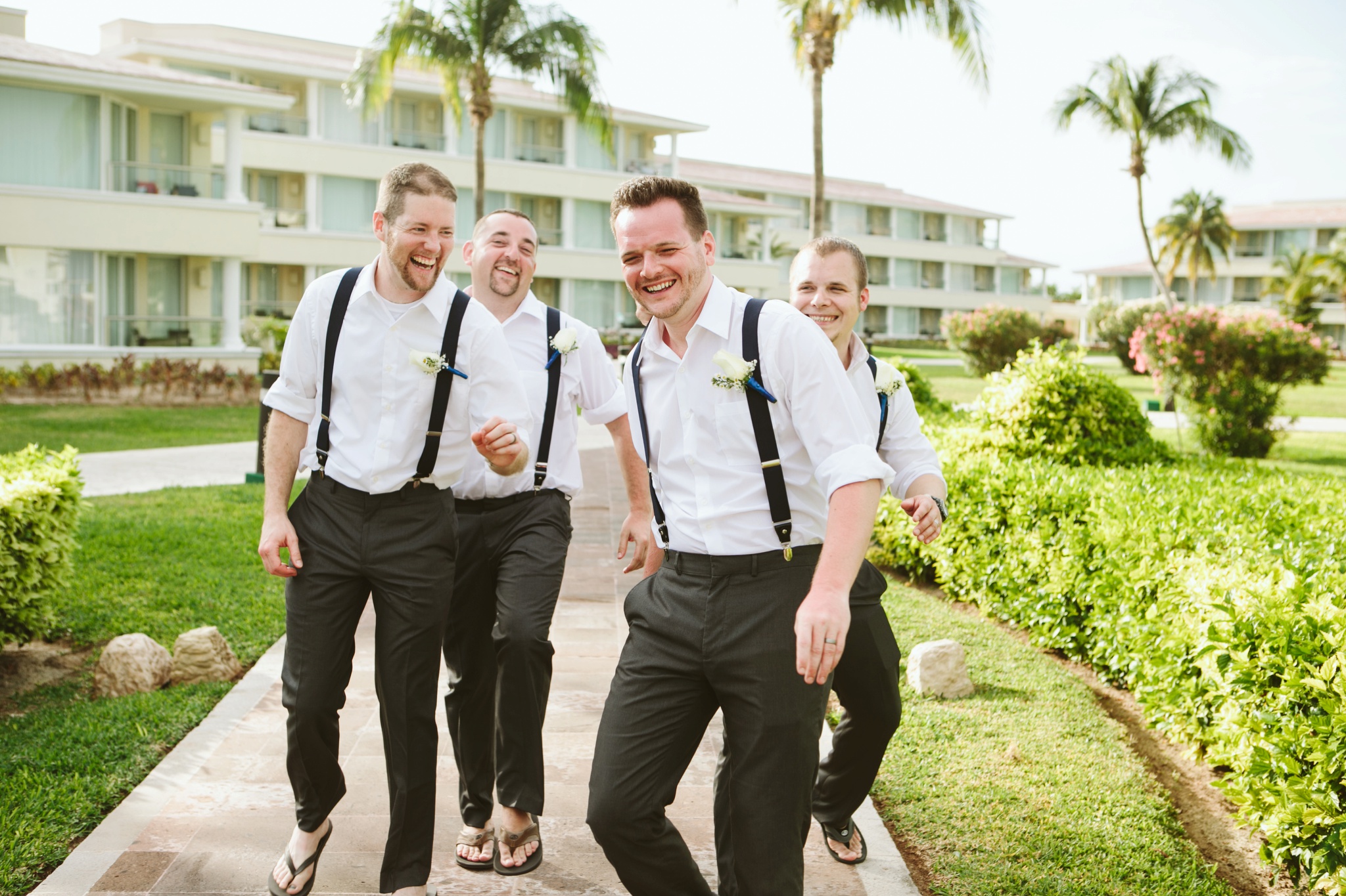 Moon Palace Resort Cancun Mexico Wedding Photos Groom Laughing with Groomsmen