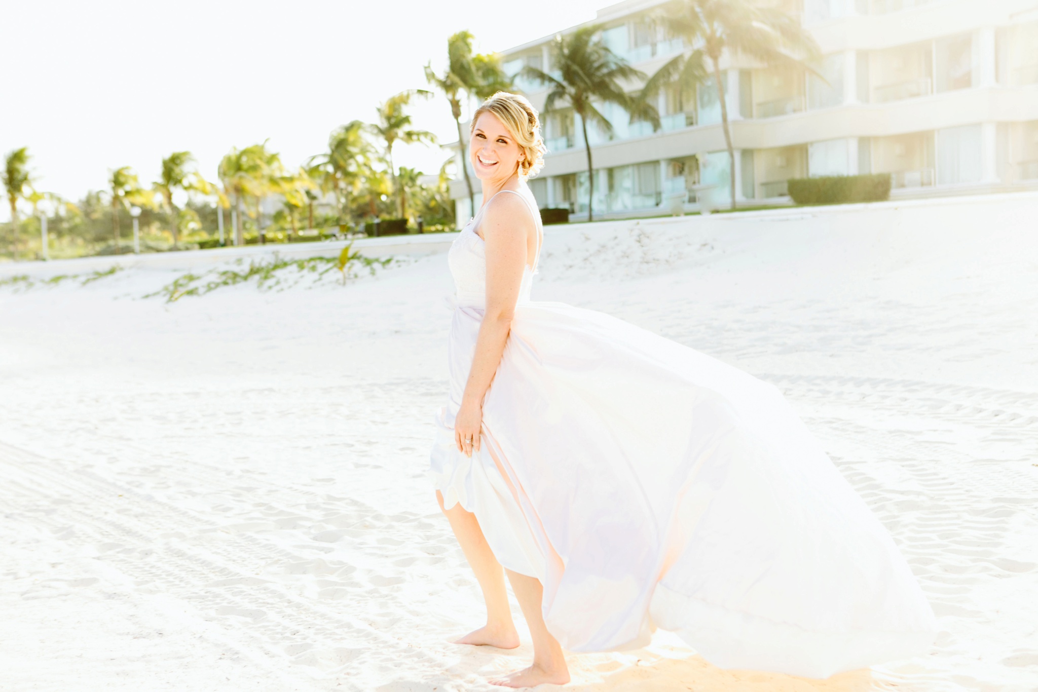 Moon Palace Resort Cancun Mexico Wedding Photos Bride Laughing on the Beach