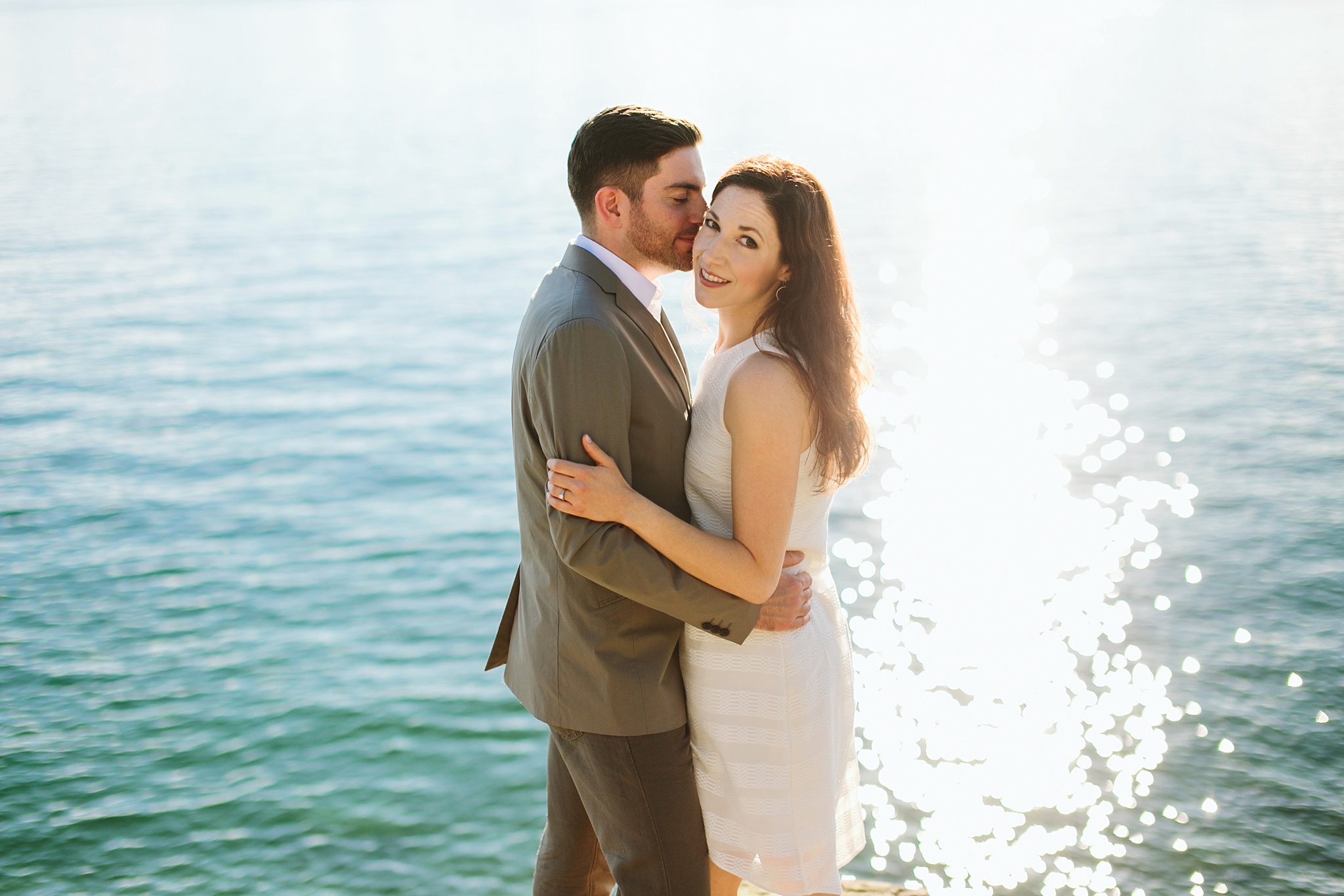 Bigfork MT Flathead Lake Engagement Photo Wayfarer Park Couple Hugging