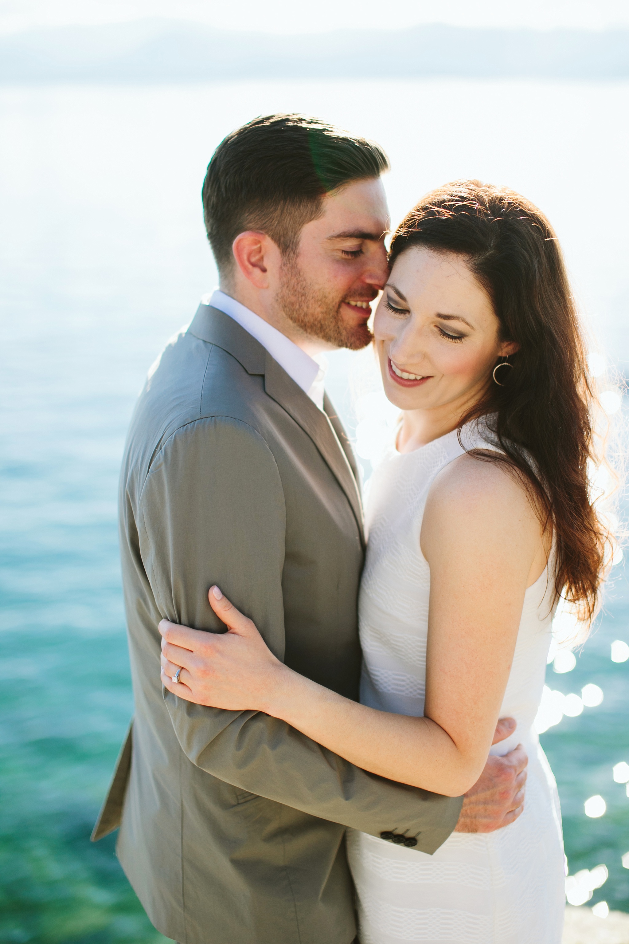 Bigfork MT Flathead Lake Engagement Photo Wayfarer Park Couple Kissing