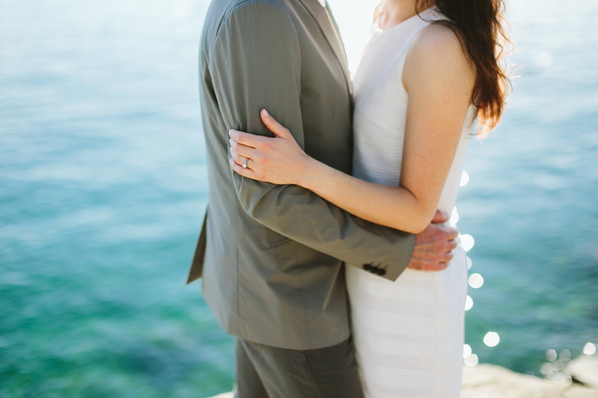 Bigfork MT Flathead Lake Engagement Photo Wayfarer Park Couple Embracing