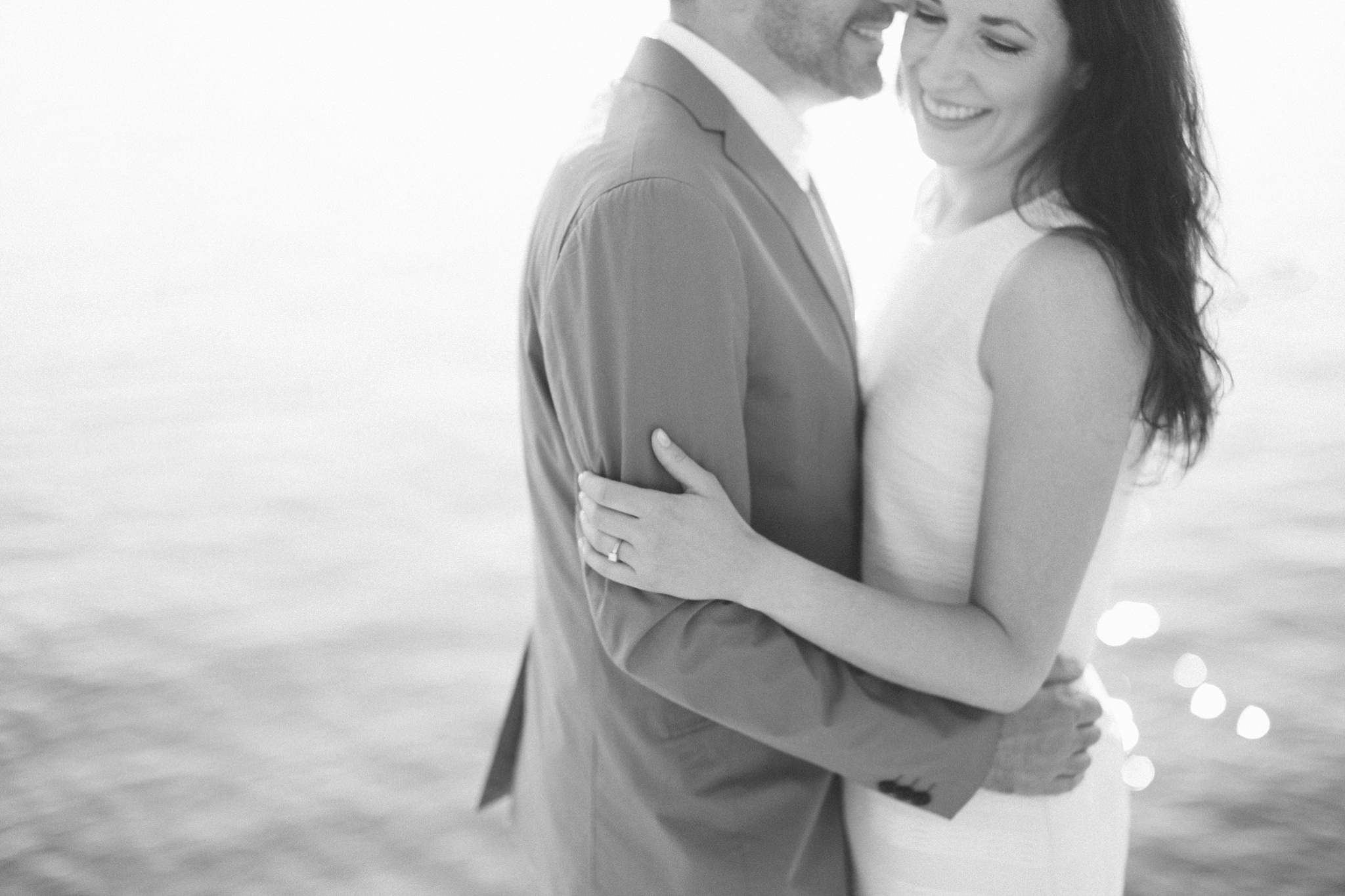 Bigfork MT Flathead Lake Engagement Photo Wayfarer Park Couple Laughing