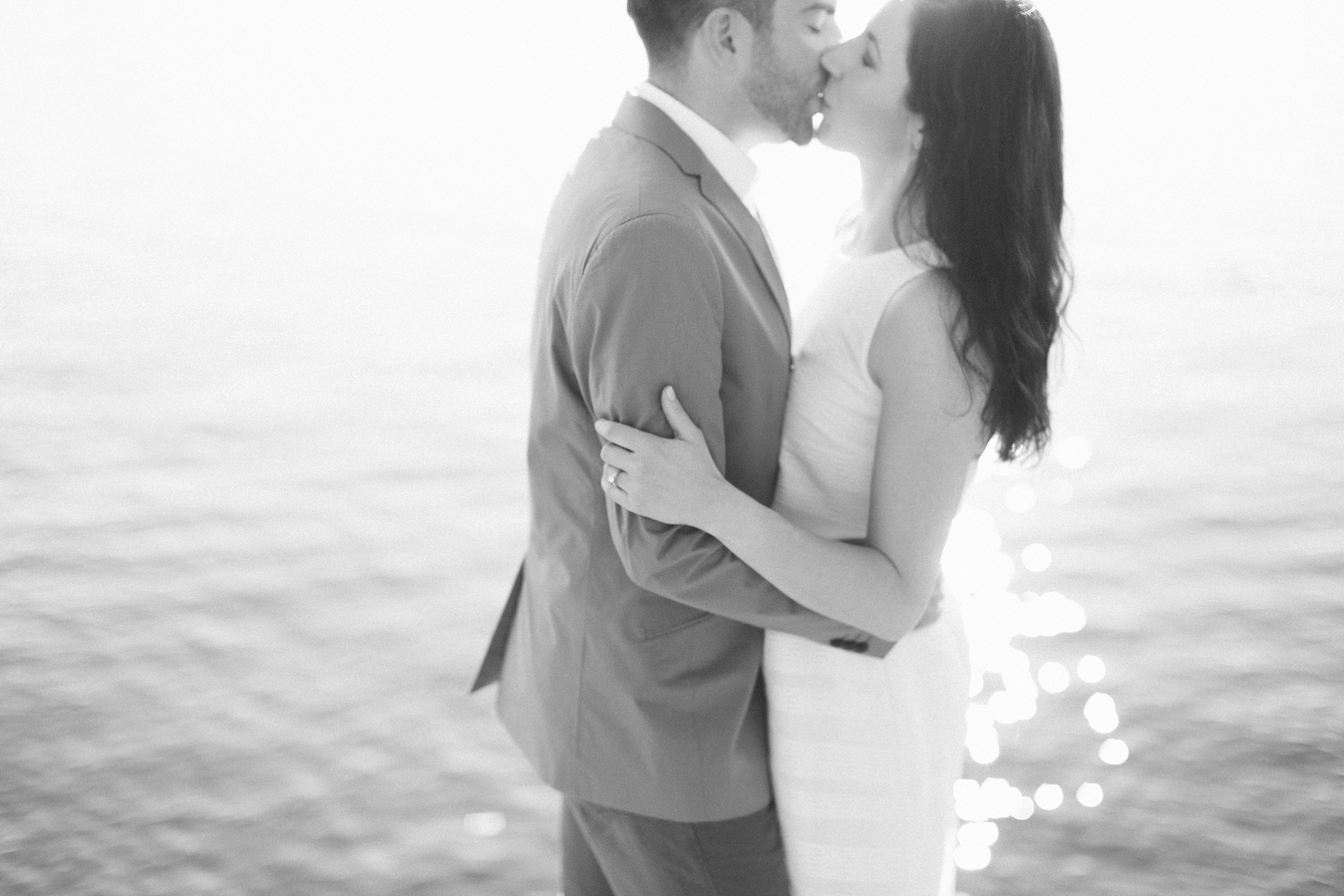 Bigfork MT Flathead Lake Engagement Photo Wayfarer Park Couple Kissing