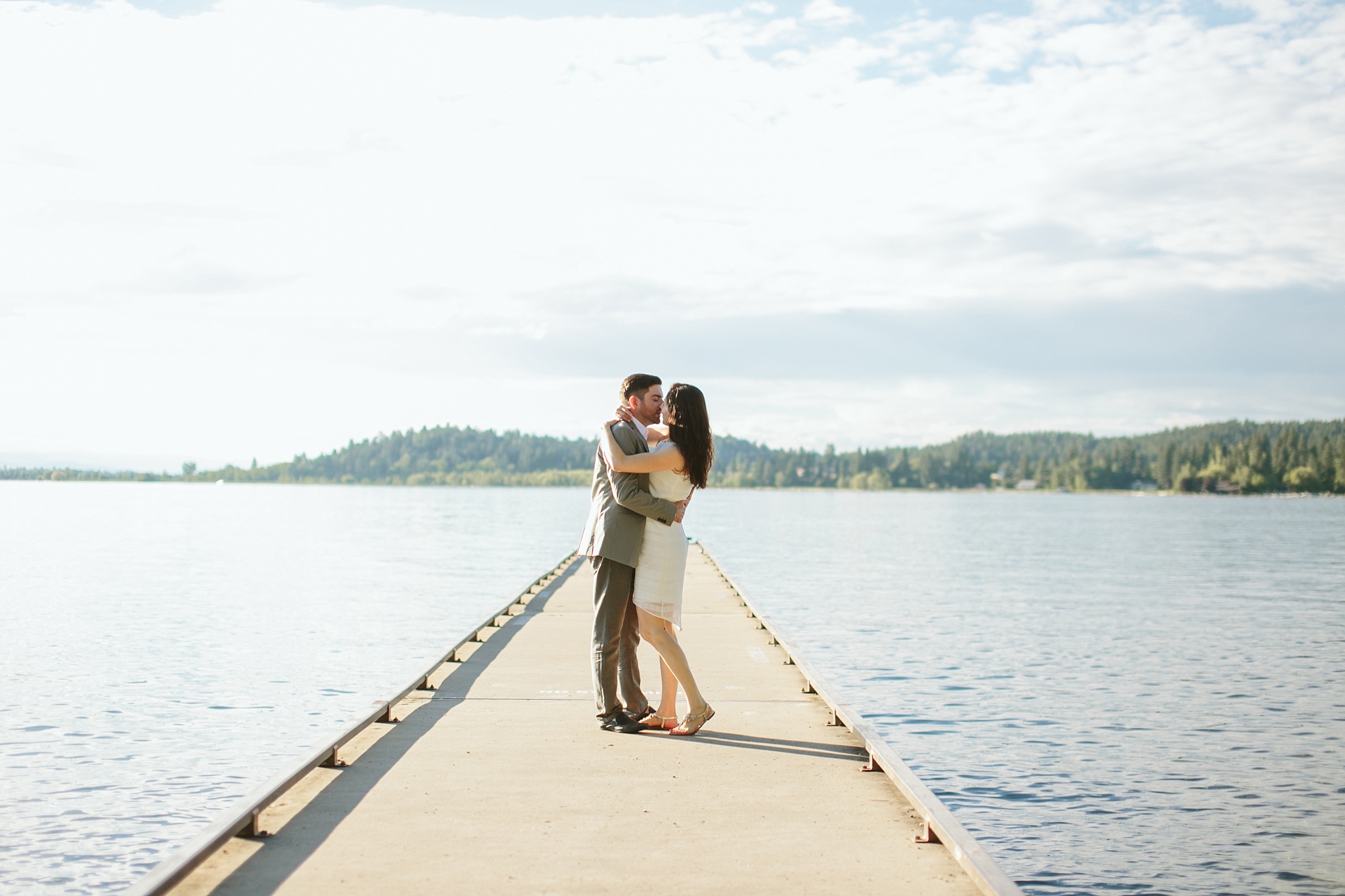 Bigfork MT Flathead Lake Engagement Photo Wayfarer Park Couple Kissing