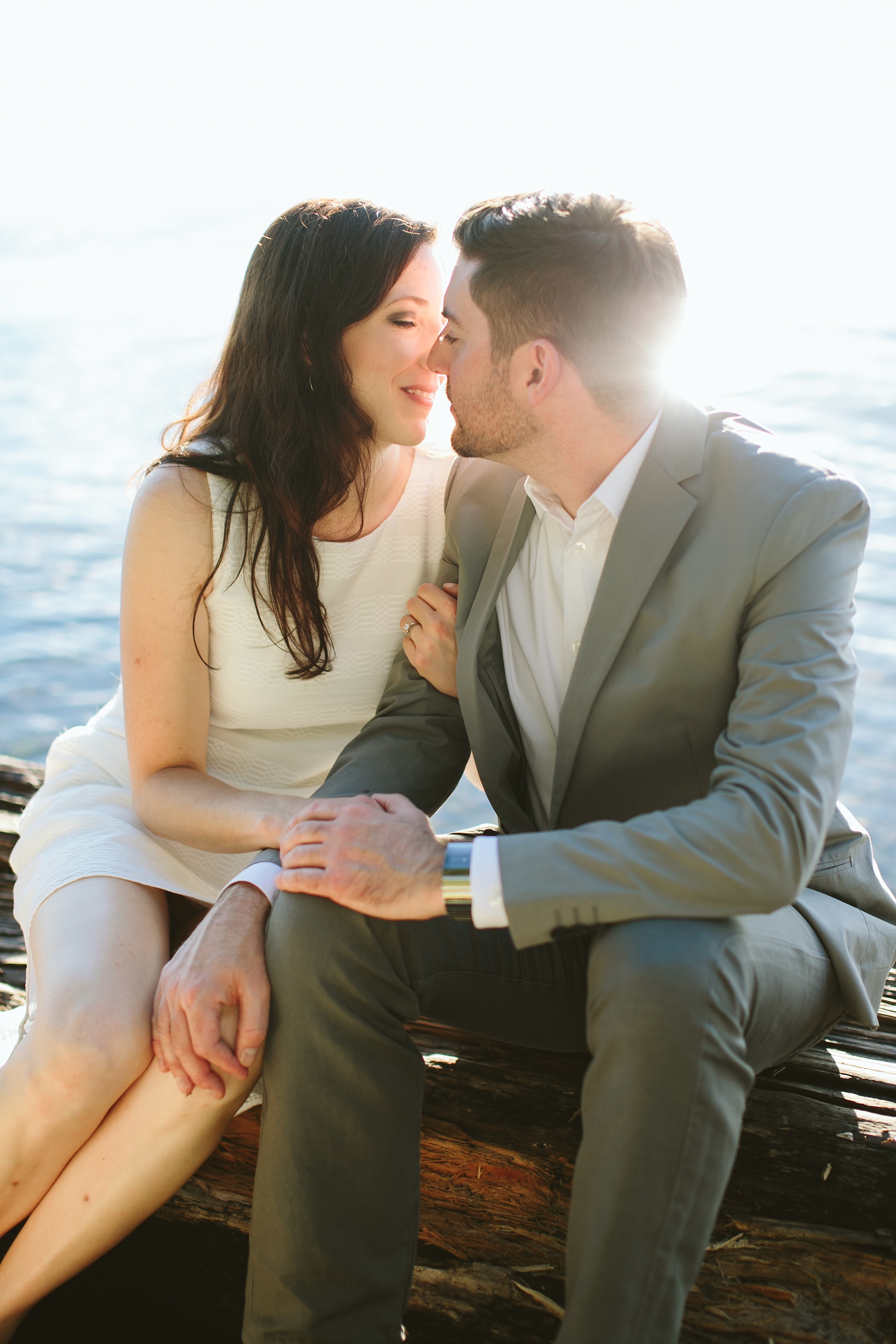 Bigfork MT Flathead Lake Engagement Photo Wayfarer Park Couple Kissing