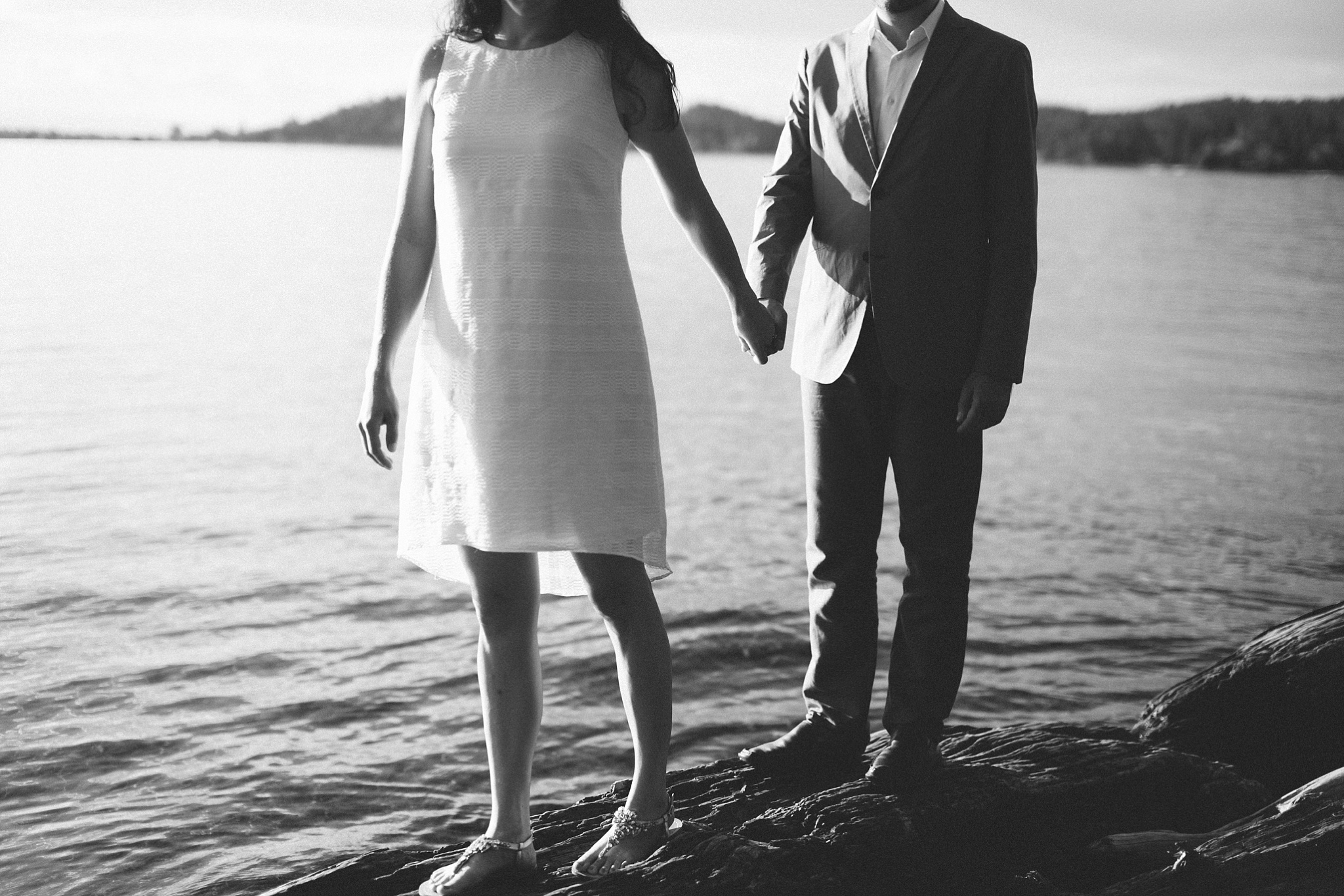 Bigfork MT Flathead Lake Engagement Photo Wayfarer Park Couple Holding Hands