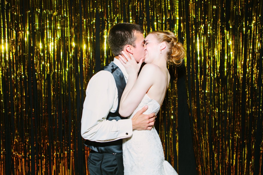 Missoula MT Spring Wedding Photos Couple Kissing Golden Globes Photobooth