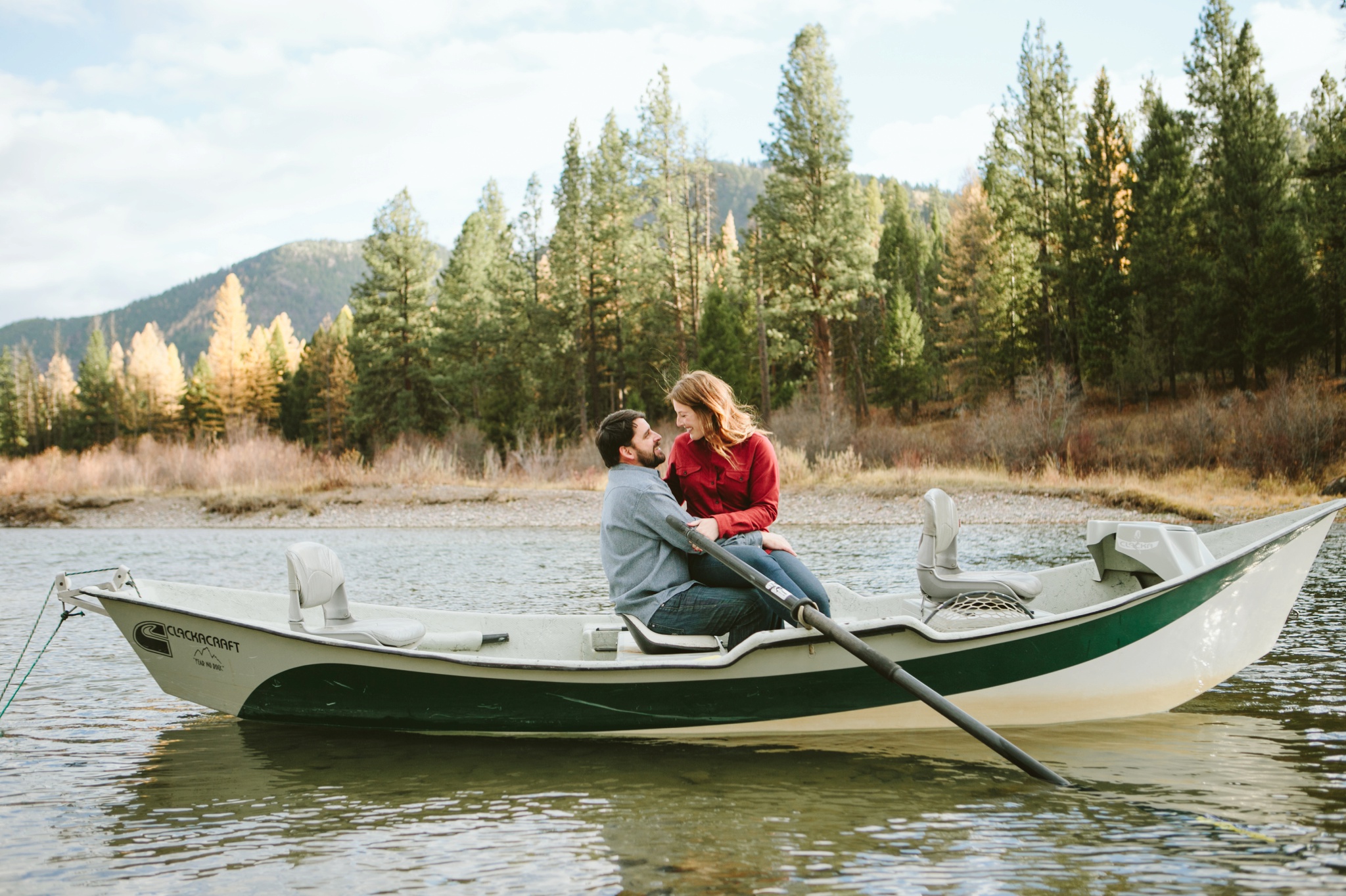 Missoula MT Forest Engagement Photos Couple in Boat in River